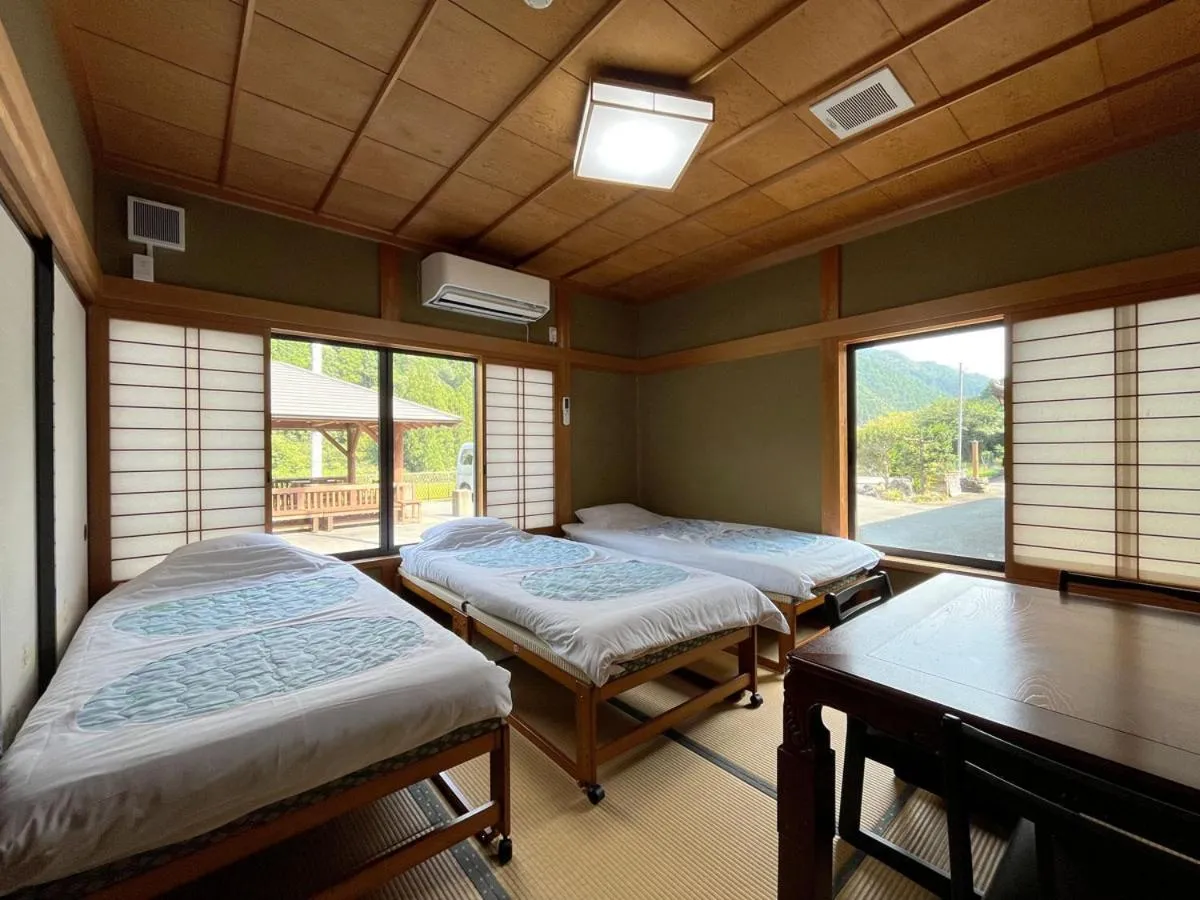 Bed in Minshuku Ryokan Kawai