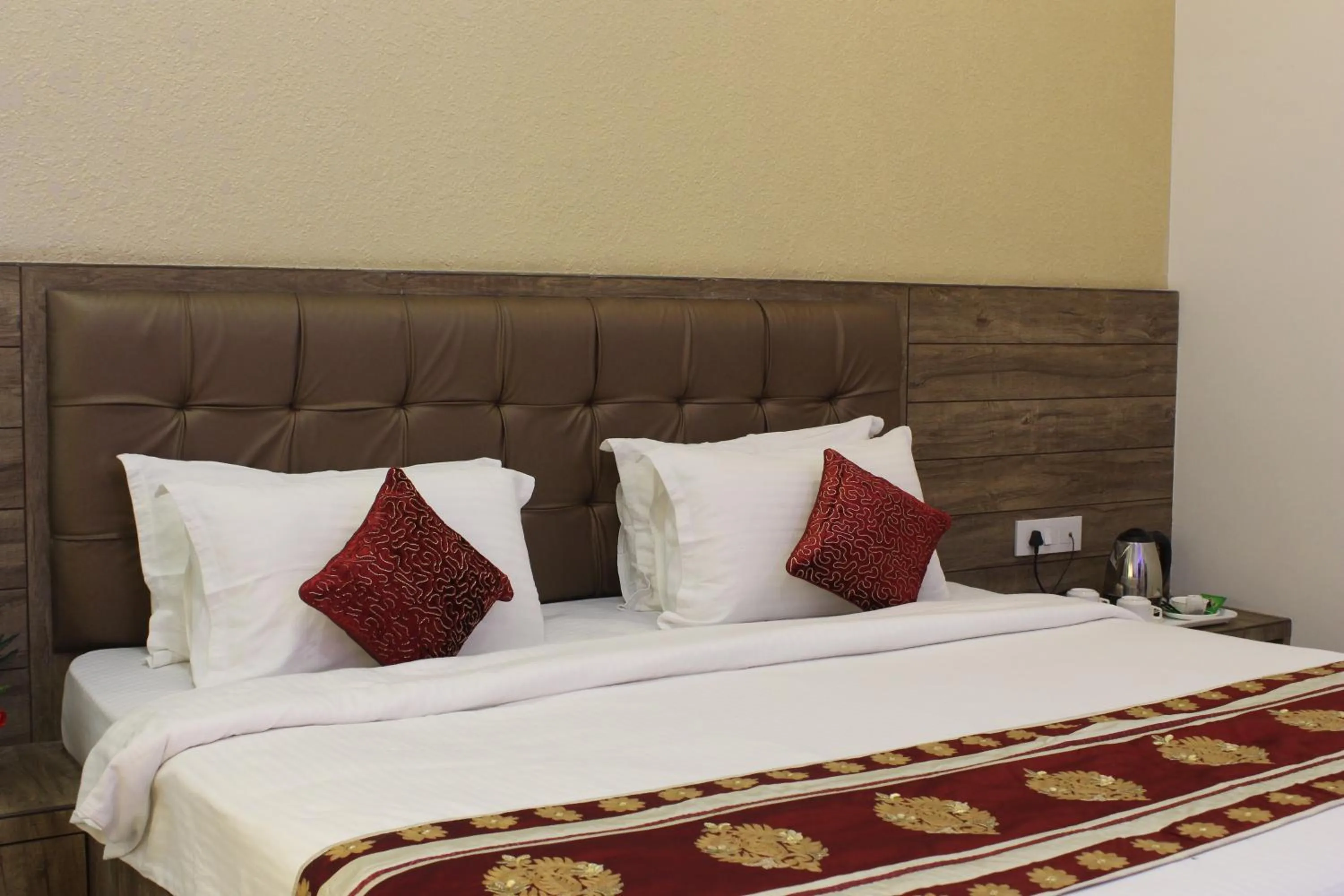 cot, Bed in Regal Hotel and restaurant