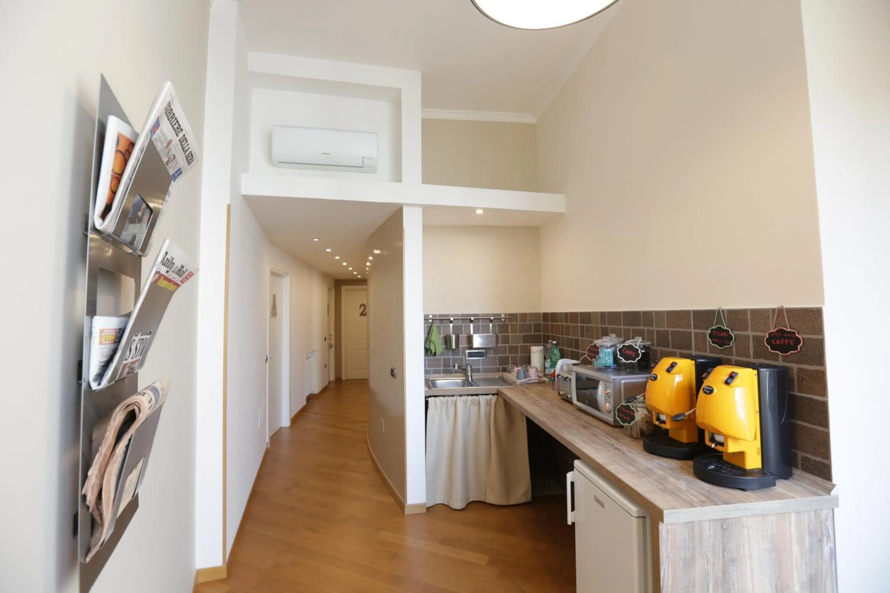 Communal lounge/ TV room in I Vicerè B&B Deluxe