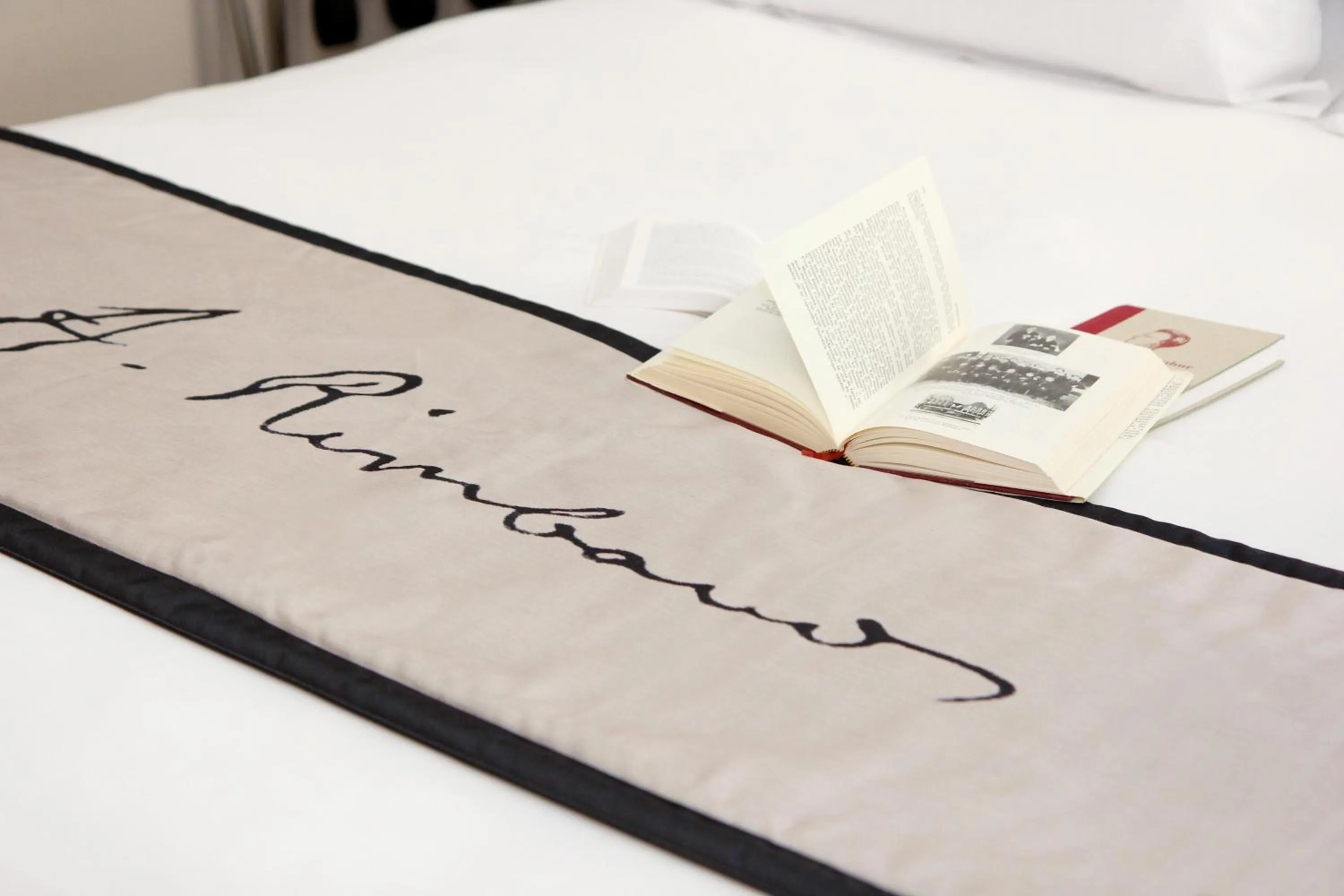 Bed in Hôtel Littéraire Arthur Rimbaud, BW Signature Collection