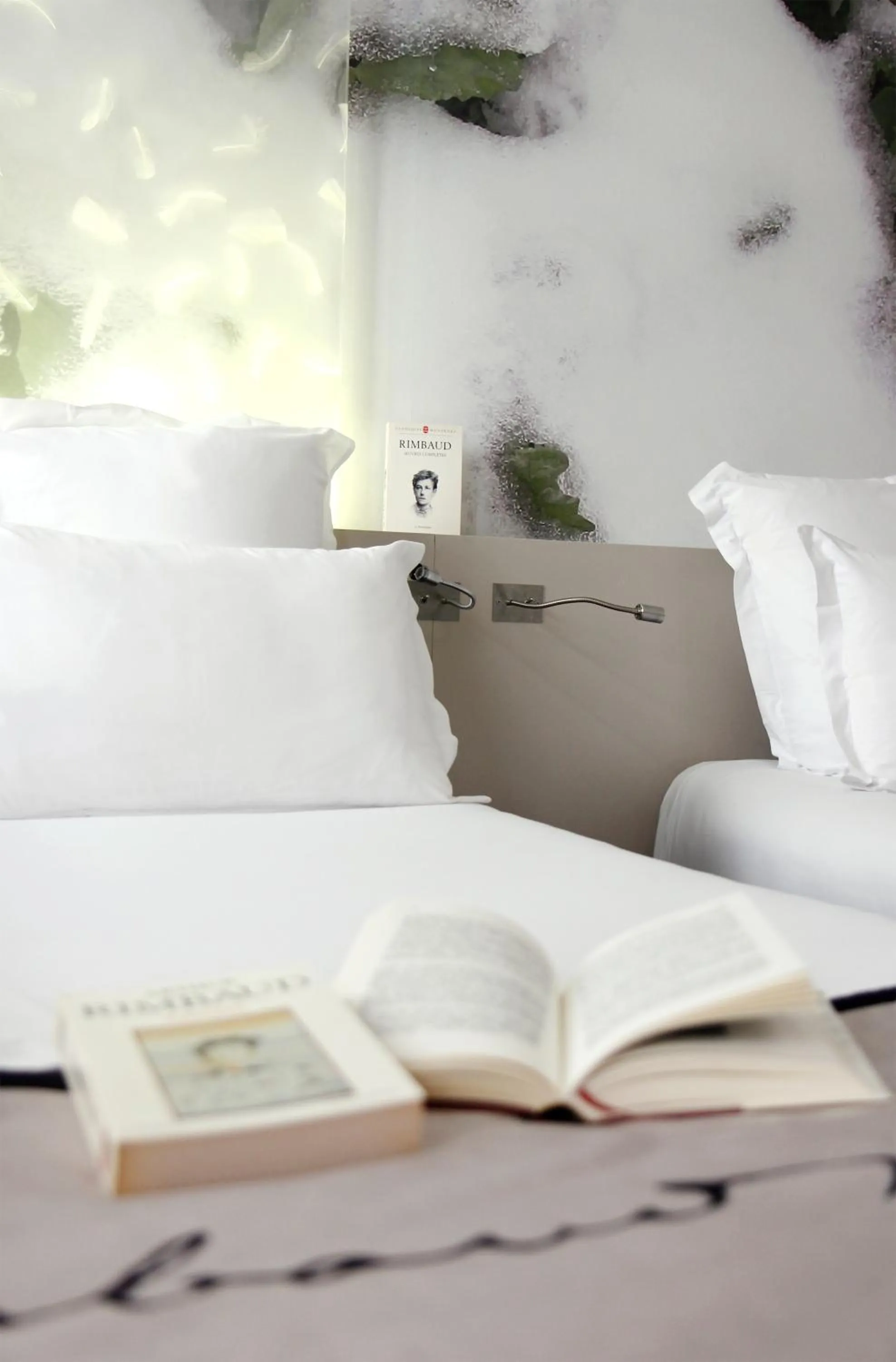 Bed in Hôtel Littéraire Arthur Rimbaud, BW Signature Collection