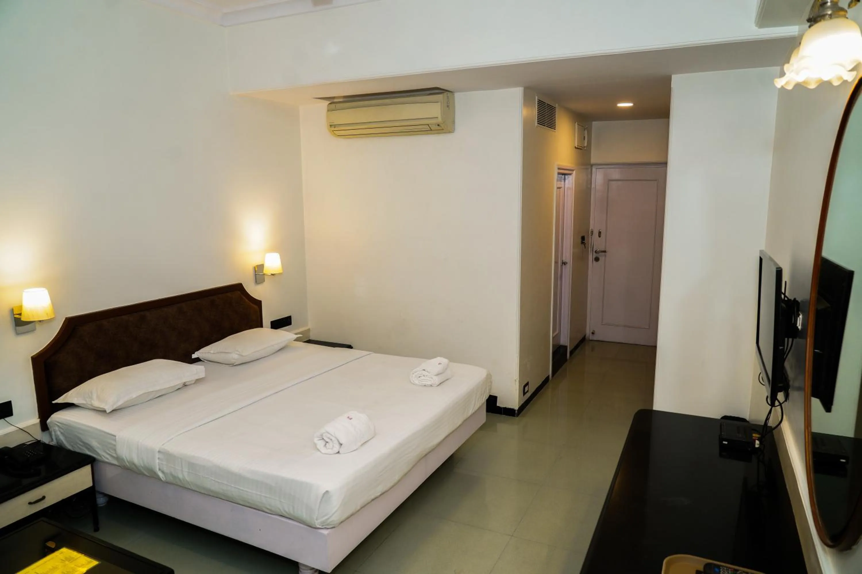 Bed in Hotel Sun Shine Inn