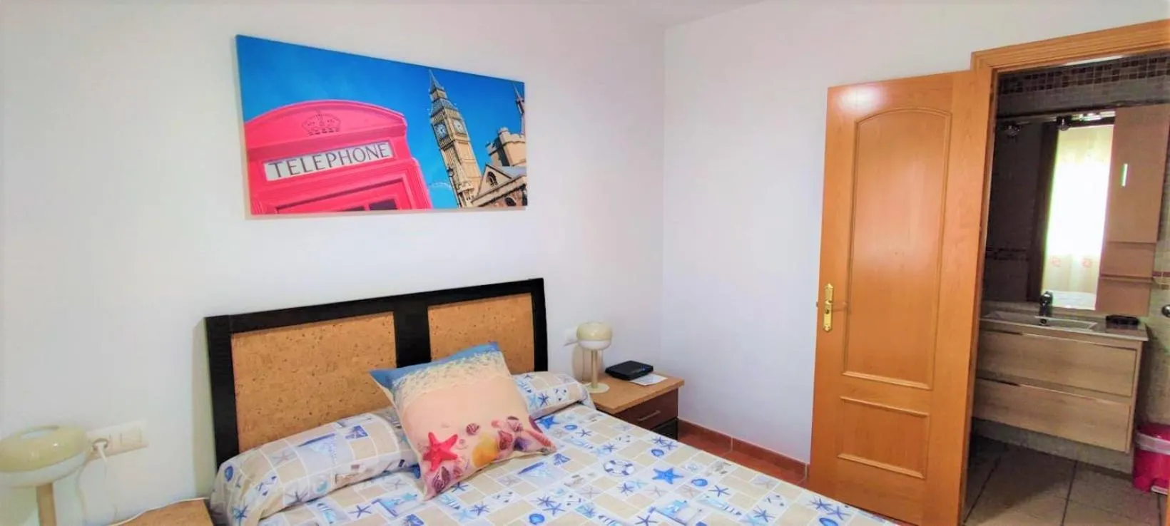 Bedroom, Bed in Apartamento Rulosol 2