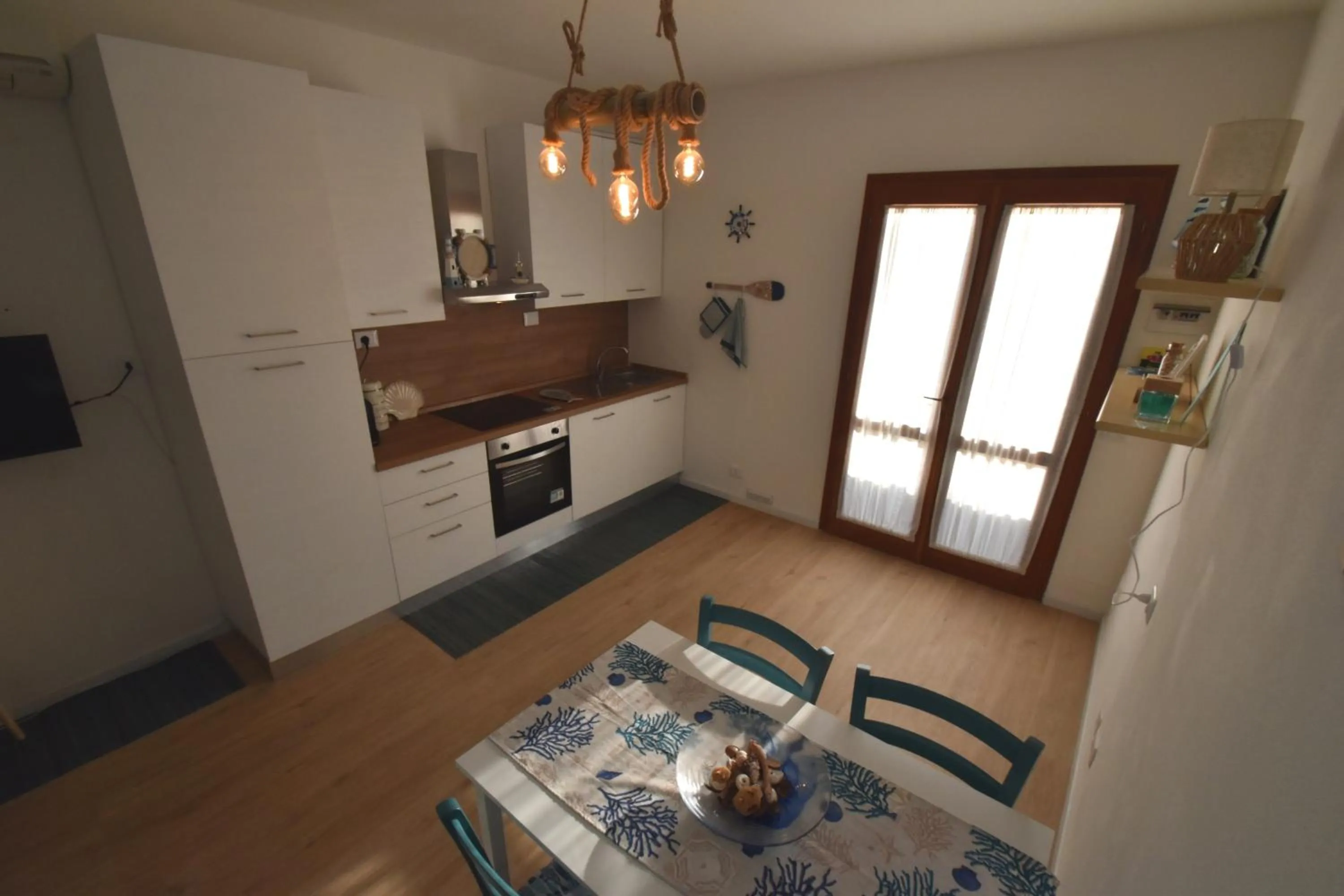 Kitchen or kitchenette in Appartamento Amapola - Bilocale in zona mare con clima e posto auto