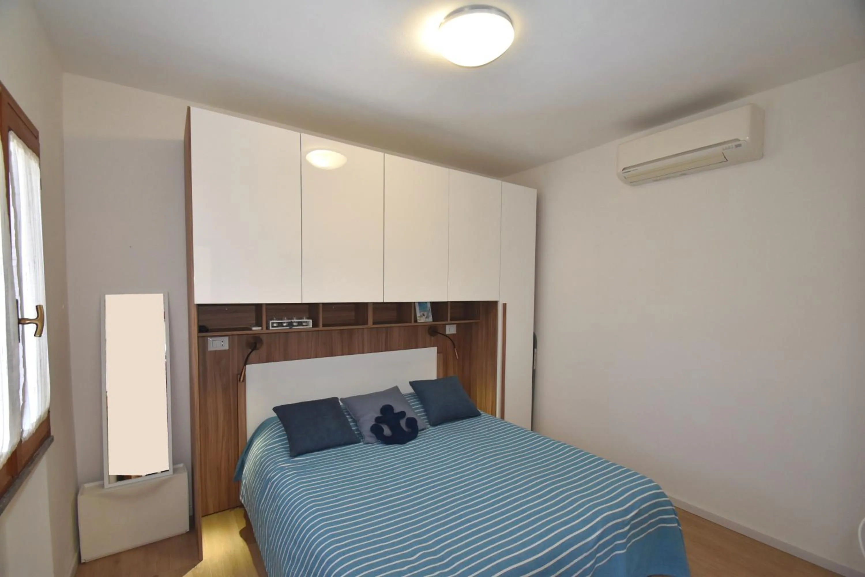 Bedroom, Bed in Appartamento Amapola - Bilocale in zona mare con clima e posto auto