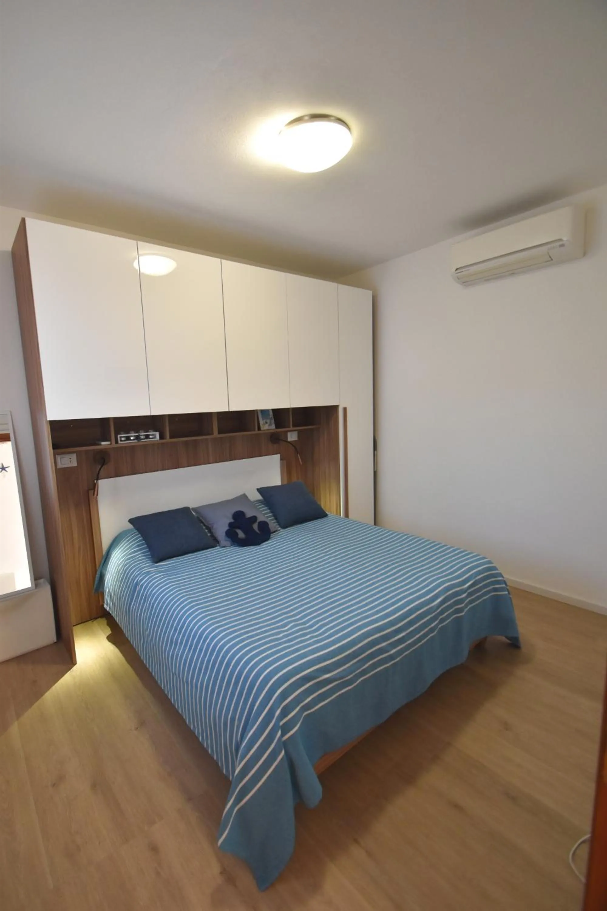 Bedroom, Bed in Appartamento Amapola - Bilocale in zona mare con clima e posto auto