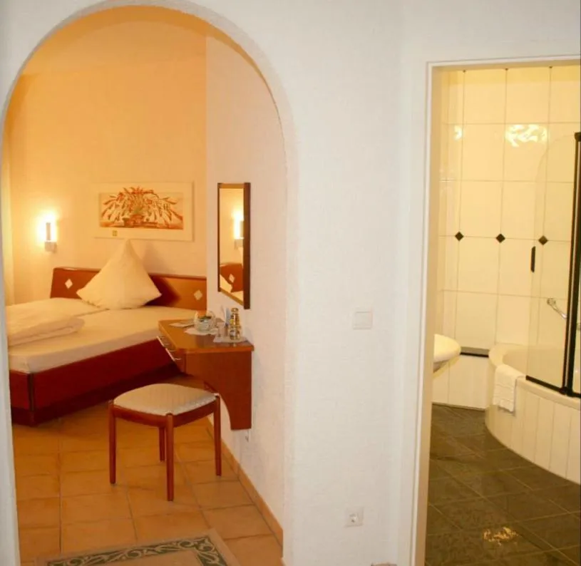 Bed in Hostellerie Bacher