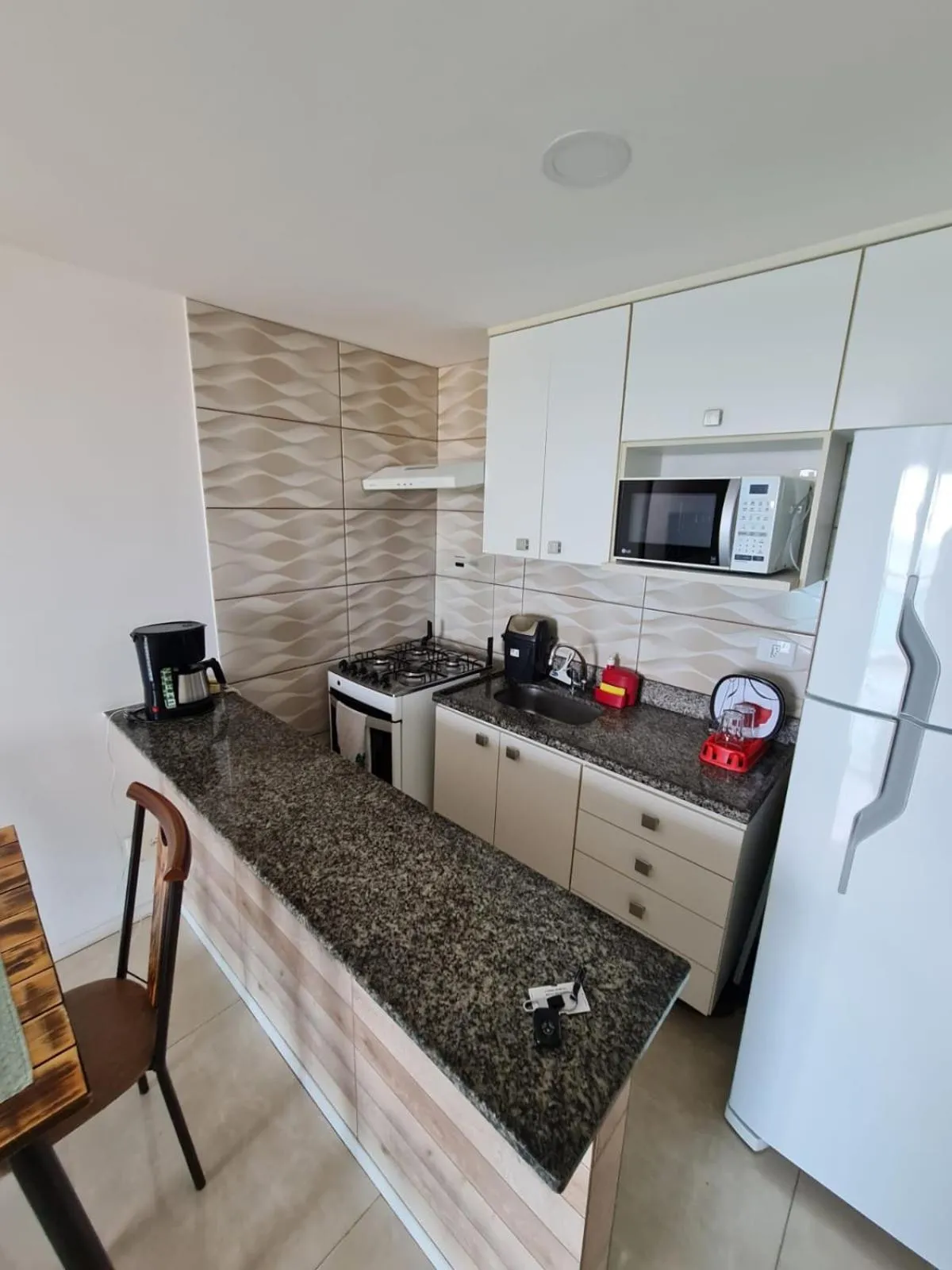 Kitchen or kitchenette in Porto Real Suites Mangaratiba