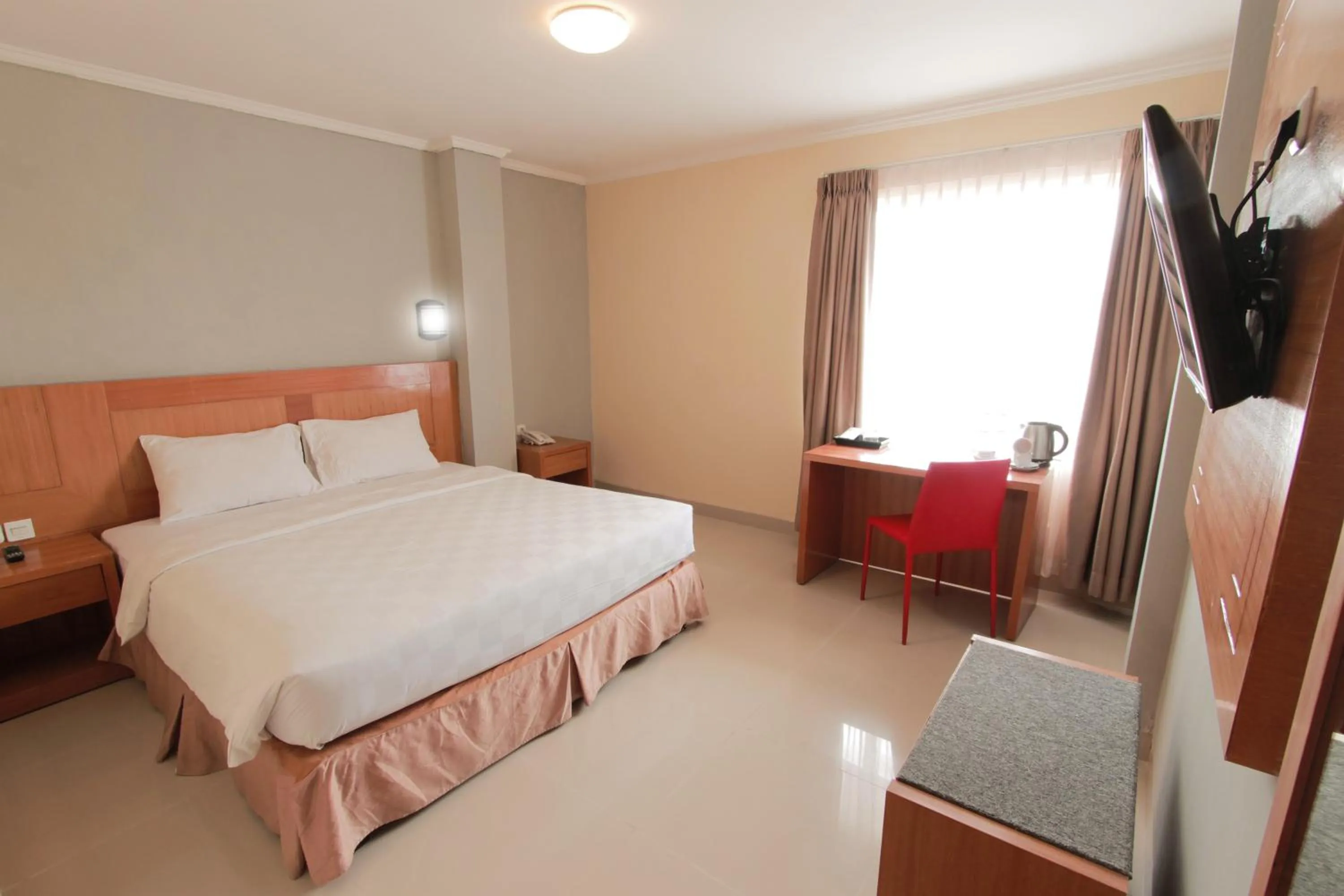 Bedroom, Bed in Maleosan Inn Manado Hotel