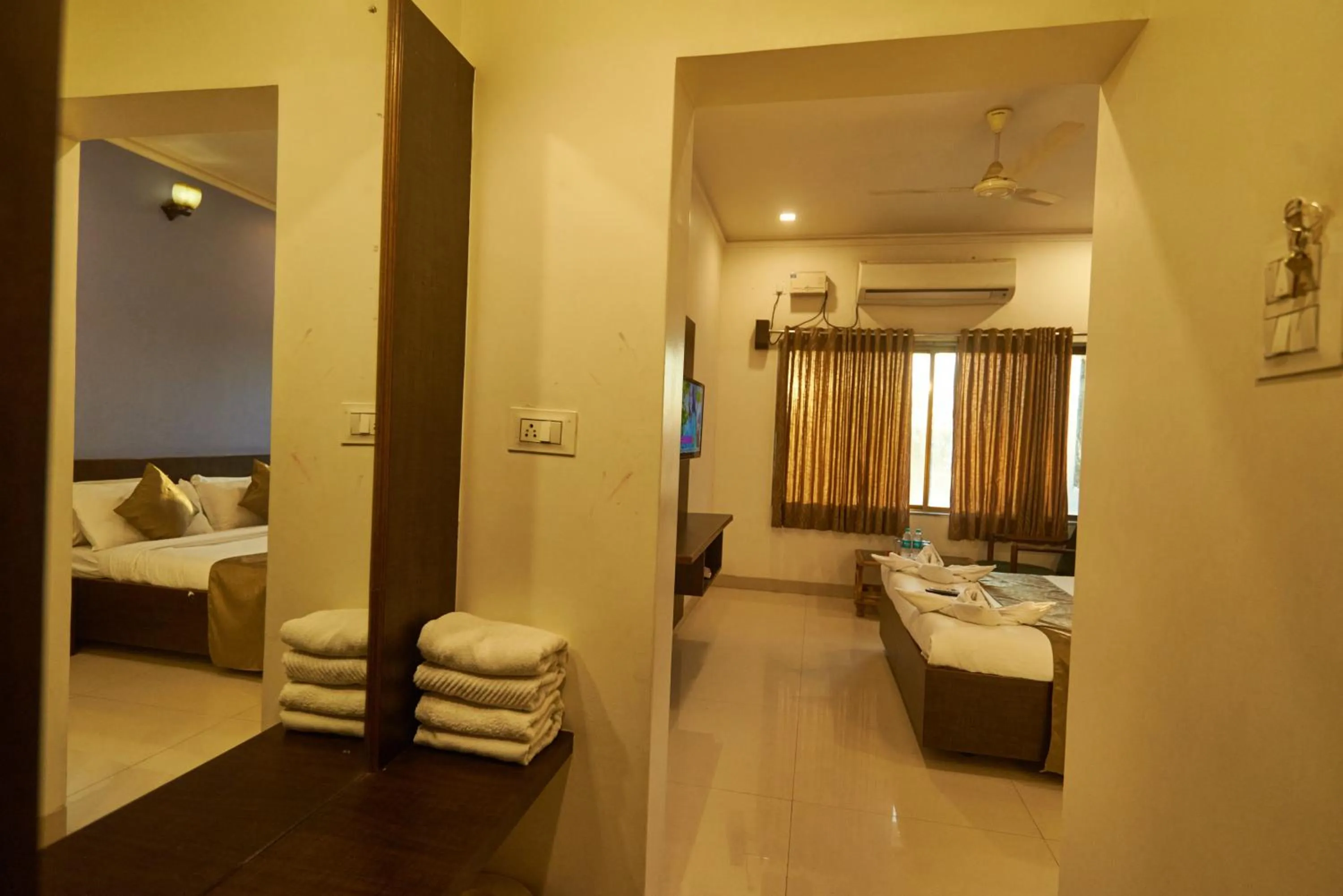 Bed in Hotel Pride Inn Shirdi