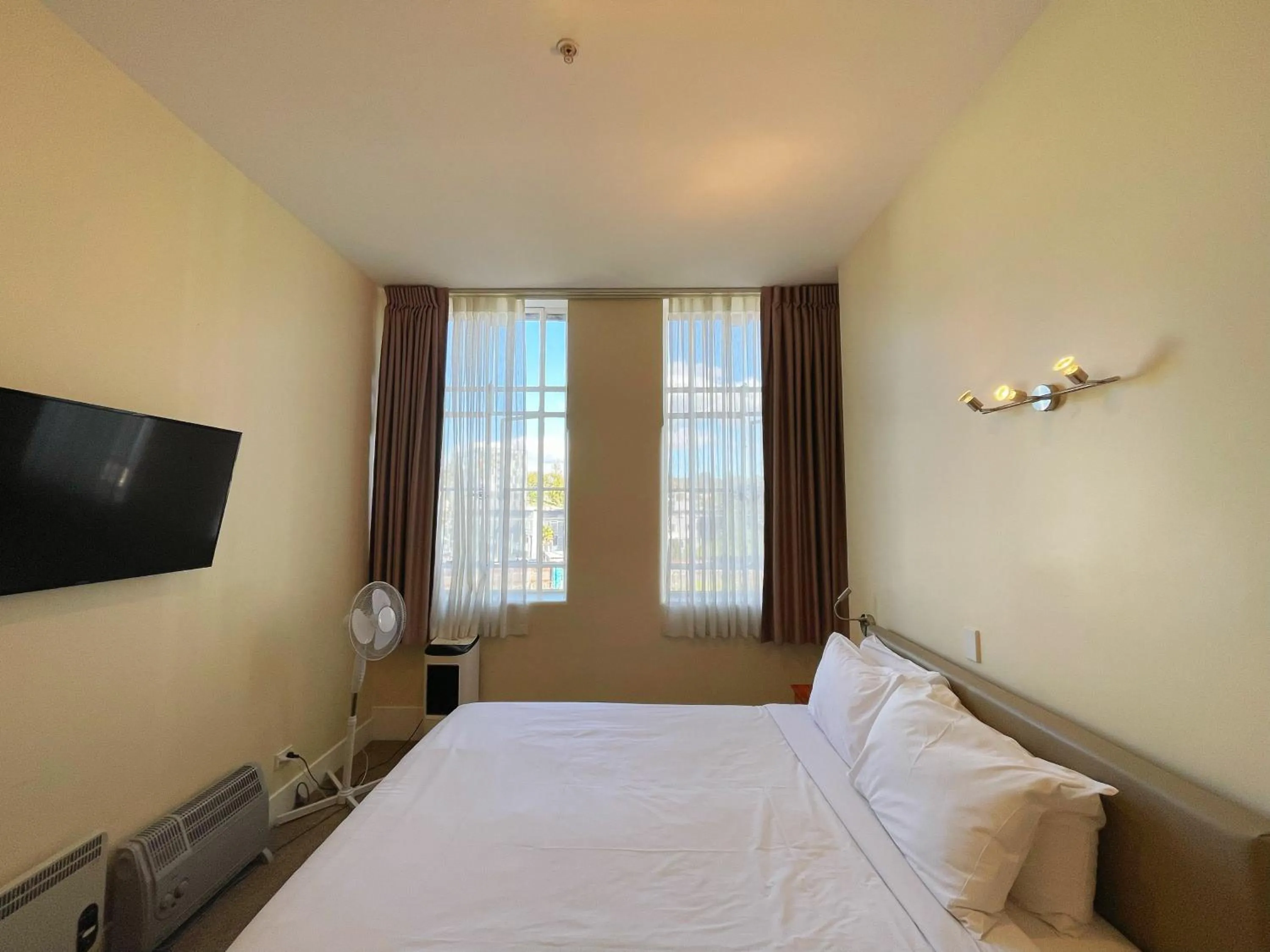 Bed in Grand Central Serviced Apartments