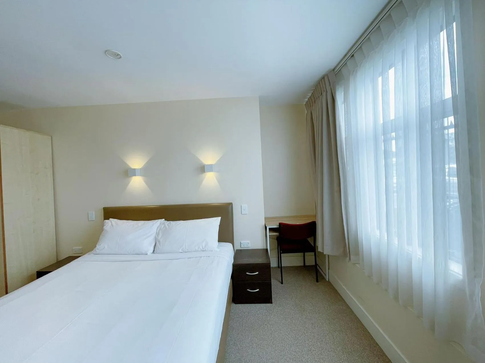 Bed in Grand Central Serviced Apartments