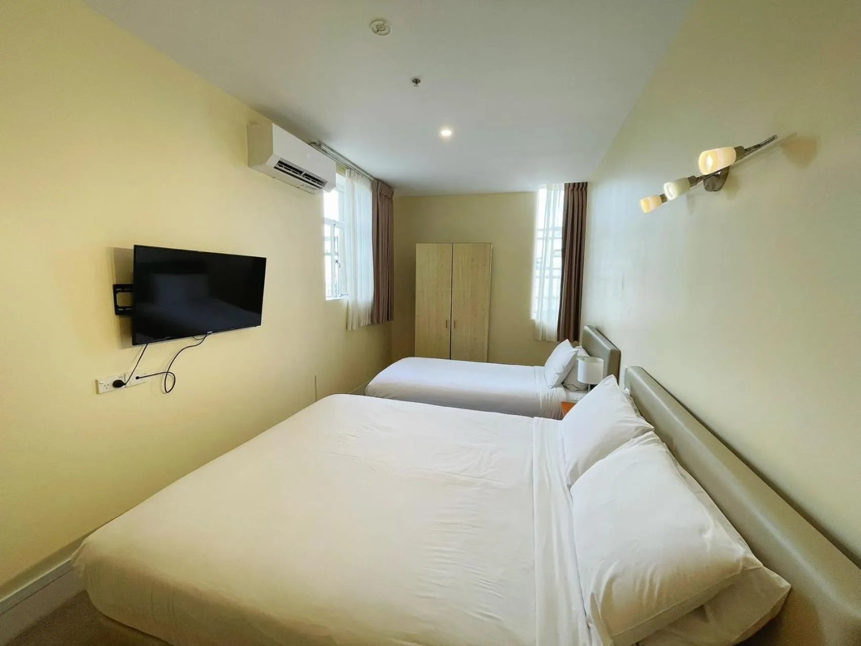 Bed in Grand Central Serviced Apartments