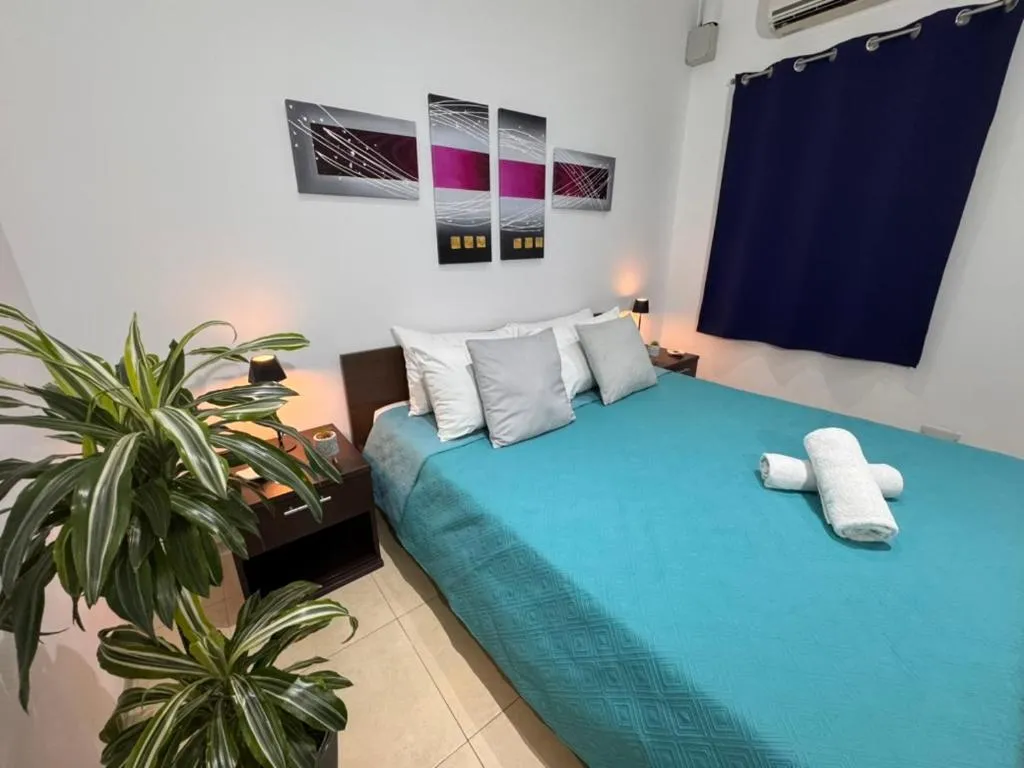 Bed in Allegro Hotel