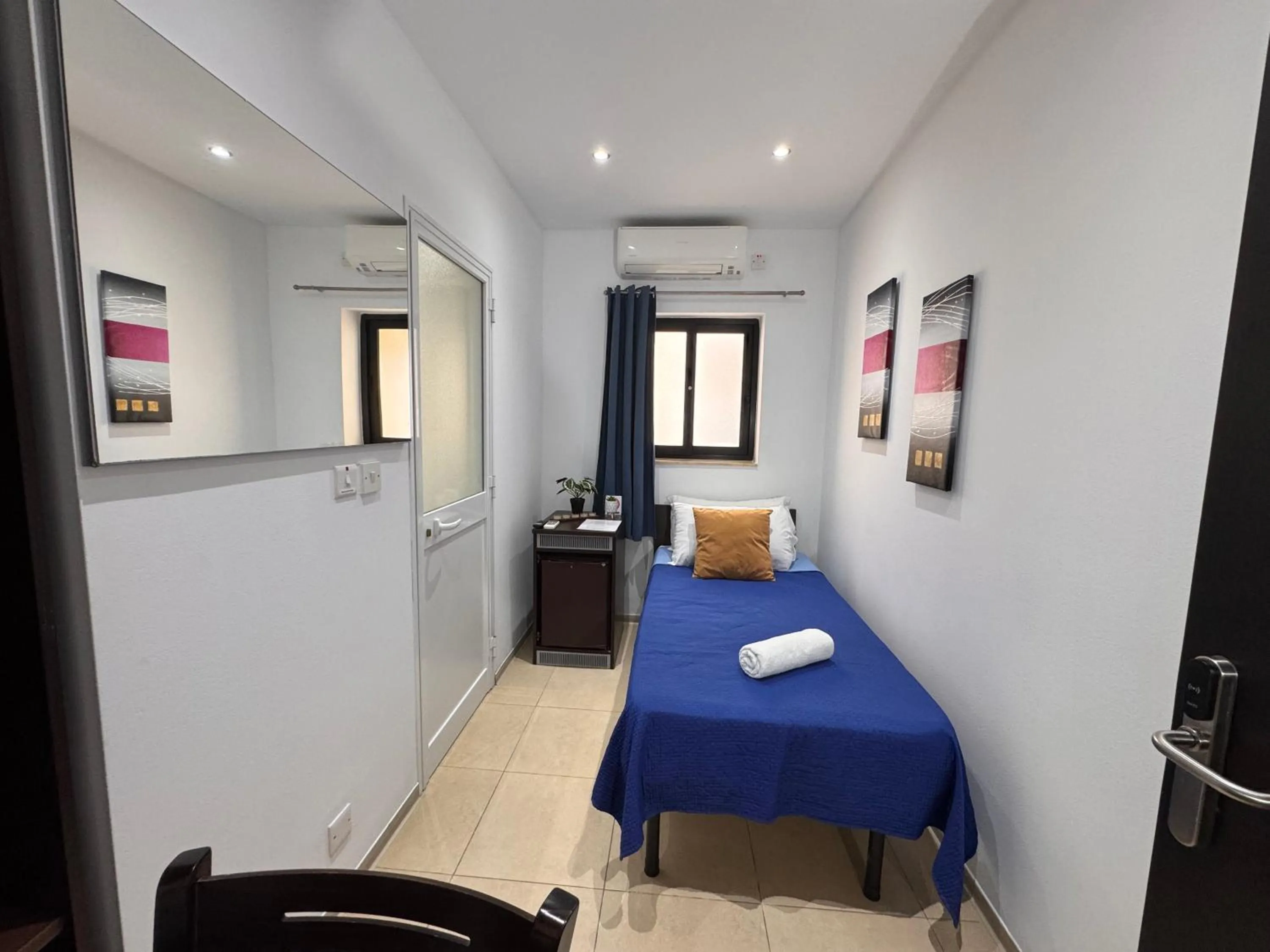 Bed in Allegro Hotel