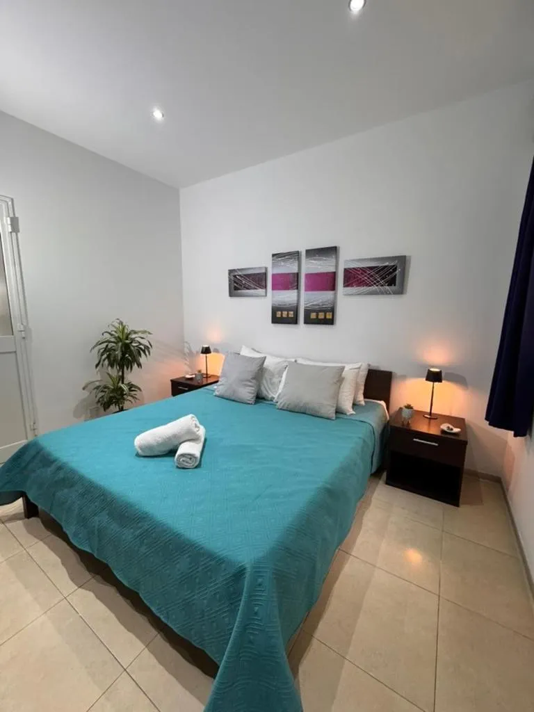 Bed in Allegro Hotel