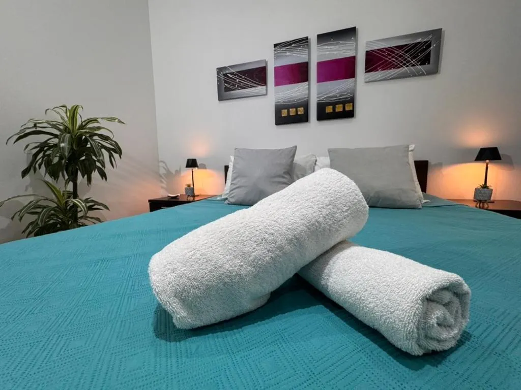 Bed in Allegro Hotel