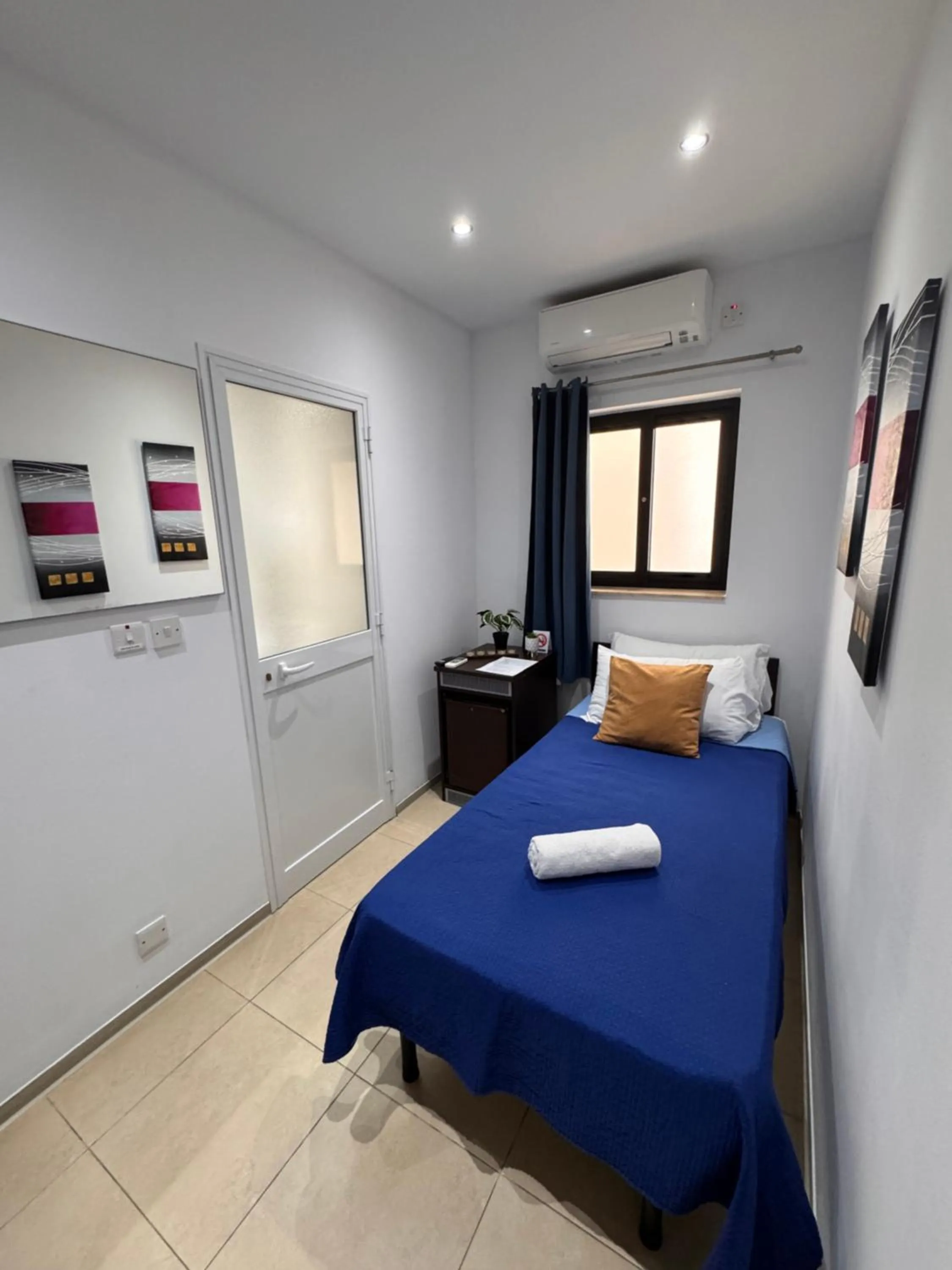 Bed in Allegro Hotel