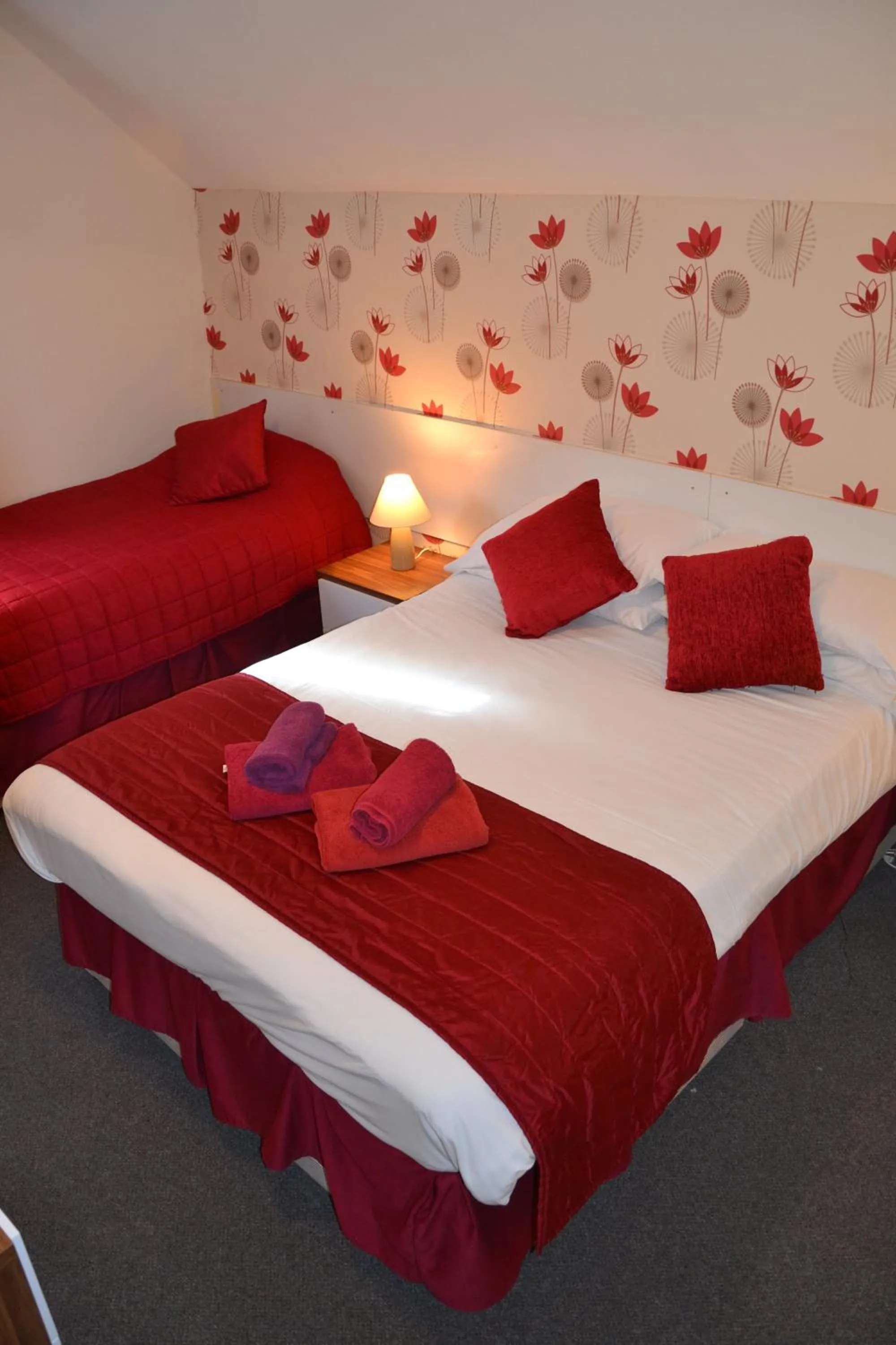 Bed in Abbey Lodge Hotel