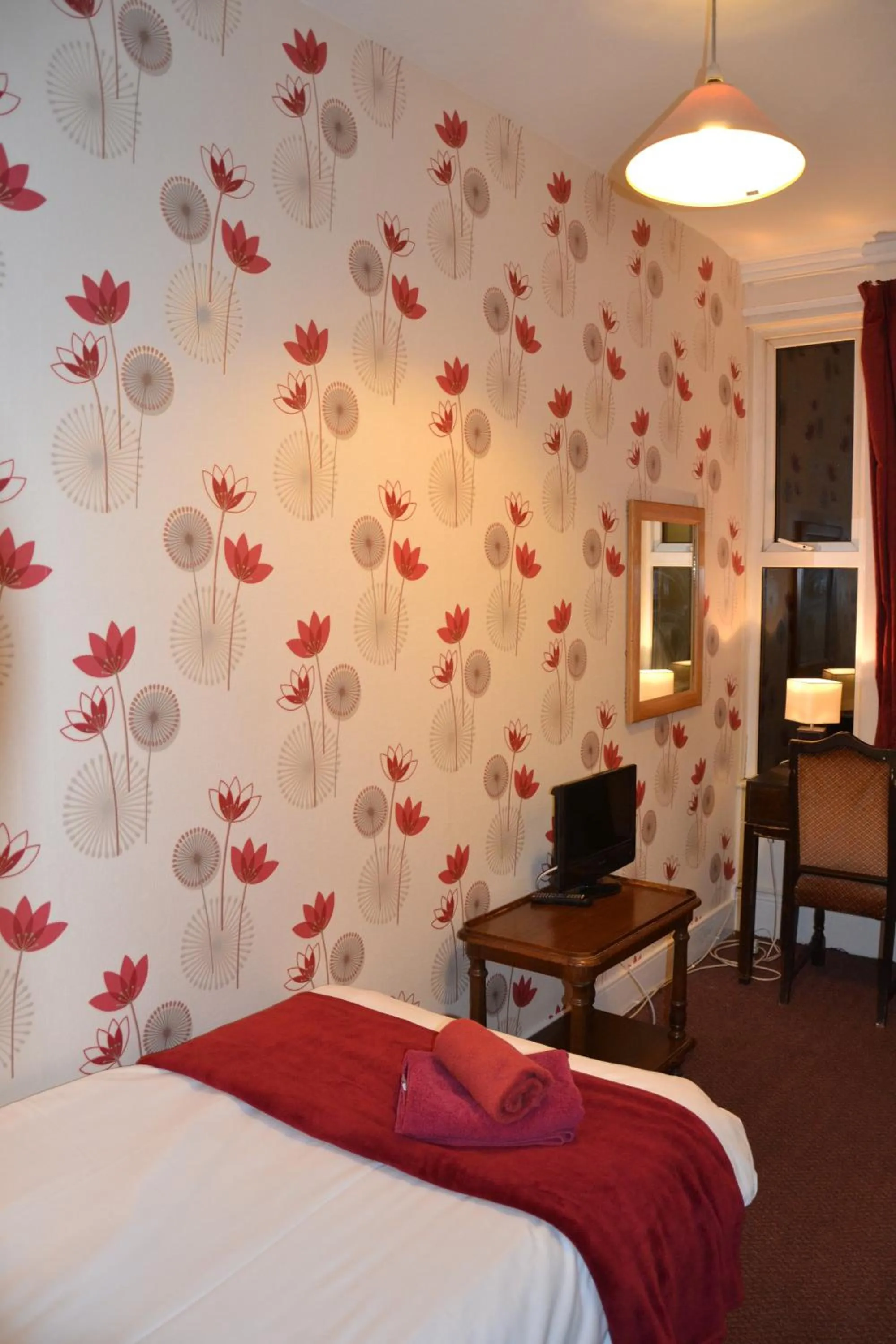 Bed in Abbey Lodge Hotel