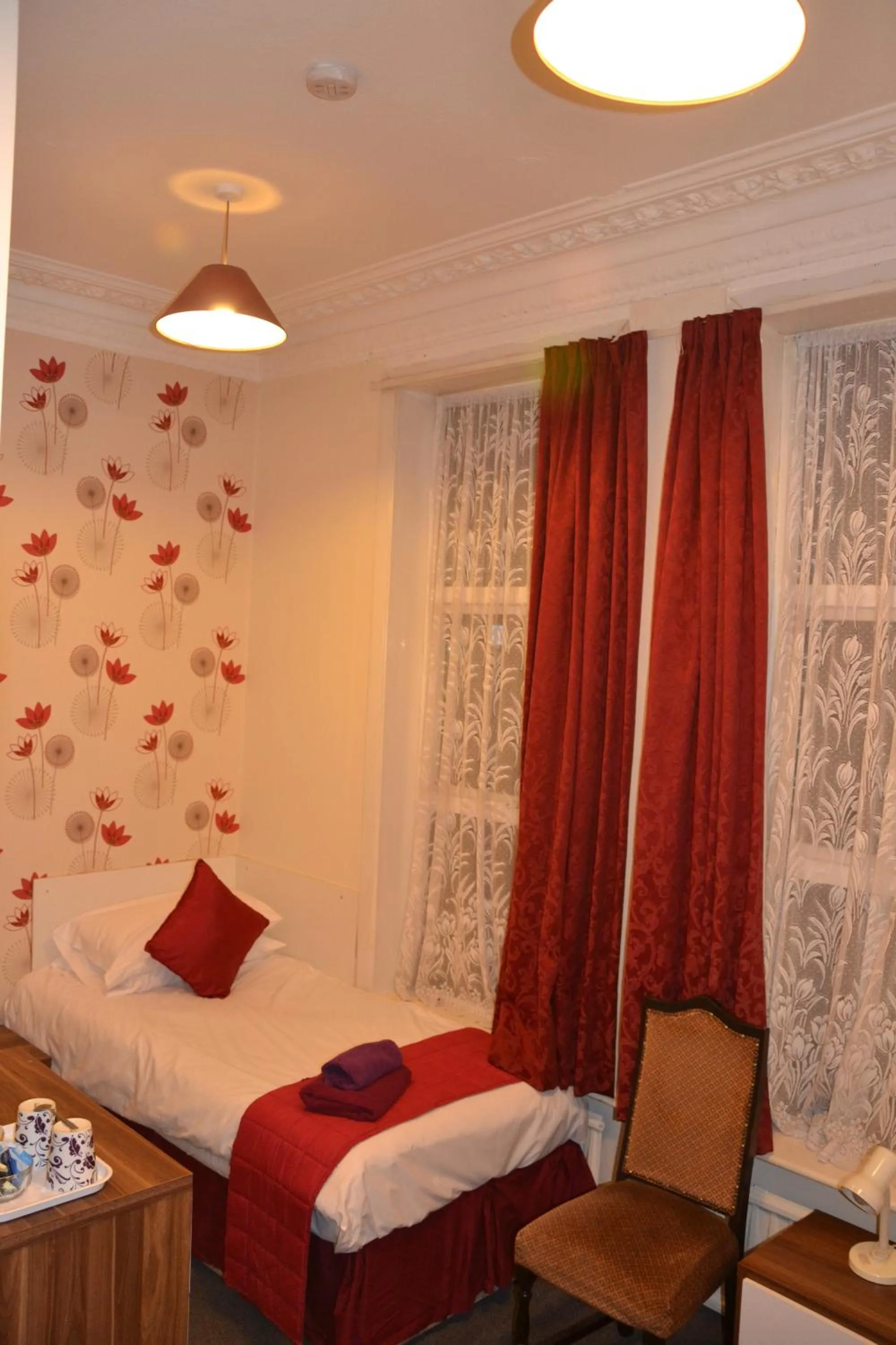 Bed in Abbey Lodge Hotel