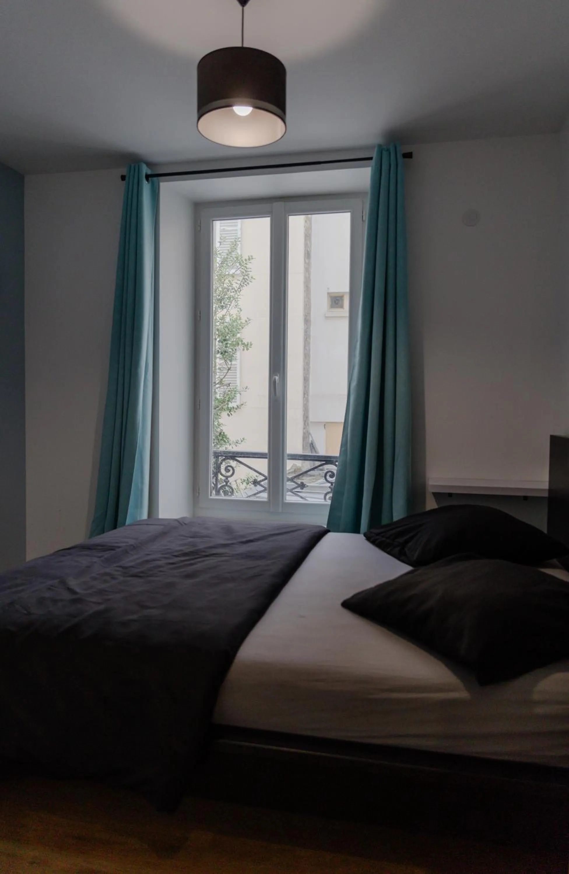 Bed in Meublés de Tourisme à Vincennes