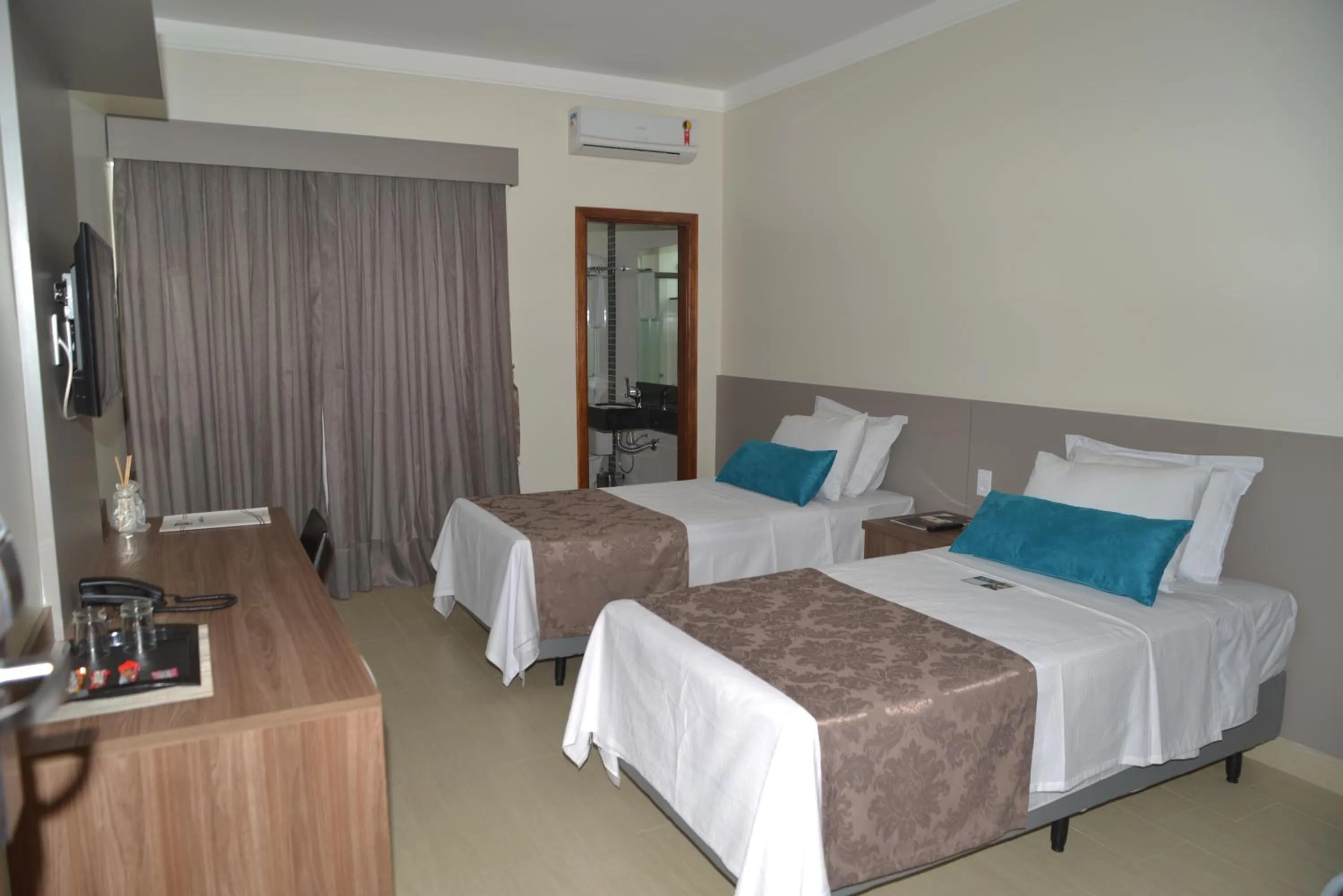 Bedroom, Bed in Racini Suites Hotel