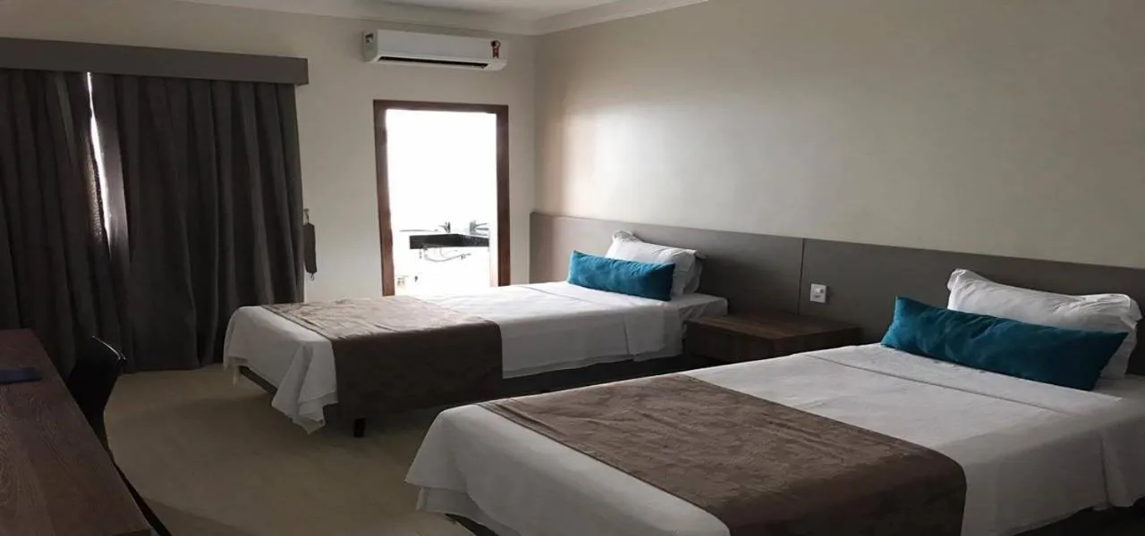 Bedroom, Bed in Racini Suites Hotel