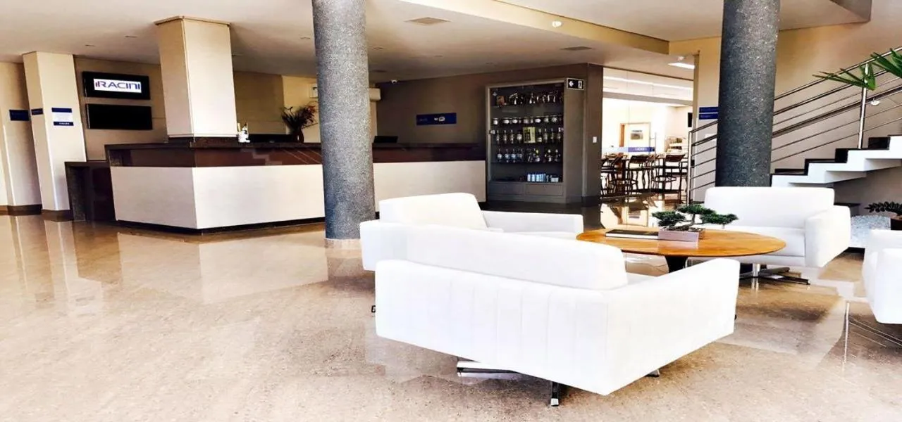 Lobby or reception in Racini Suites Hotel