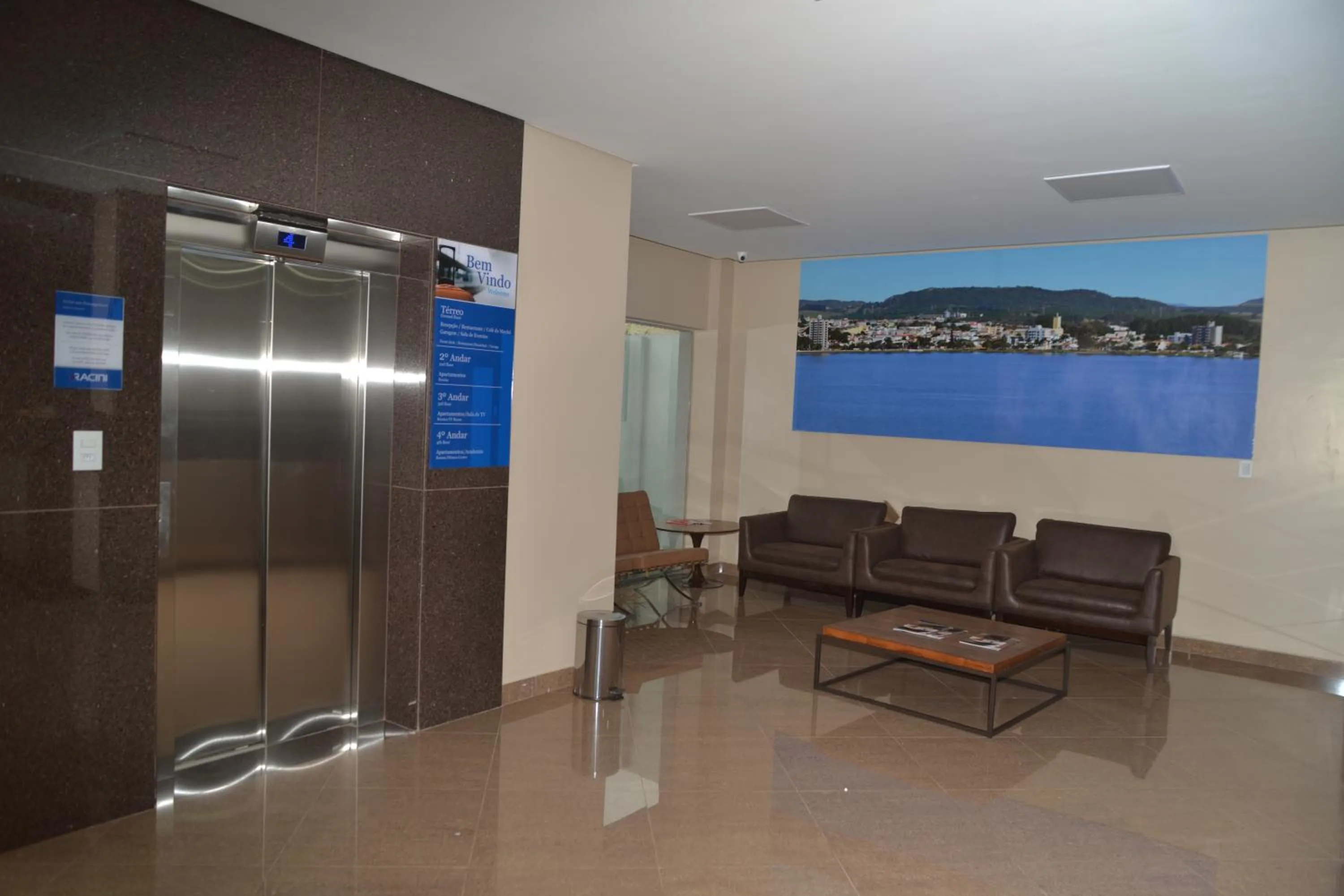 Lobby or reception in Racini Suites Hotel
