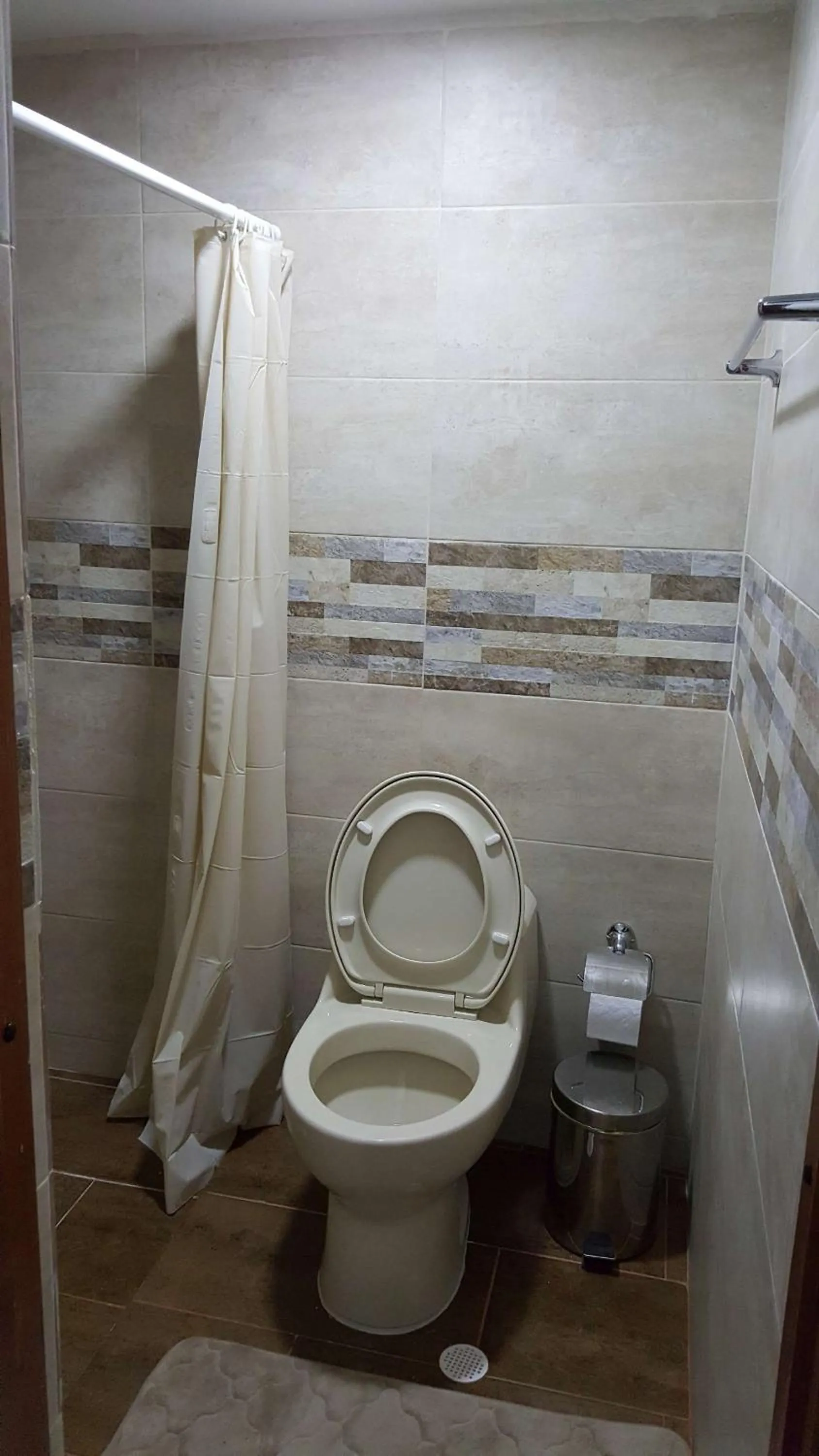 Shower in Beach Paradise Apartments