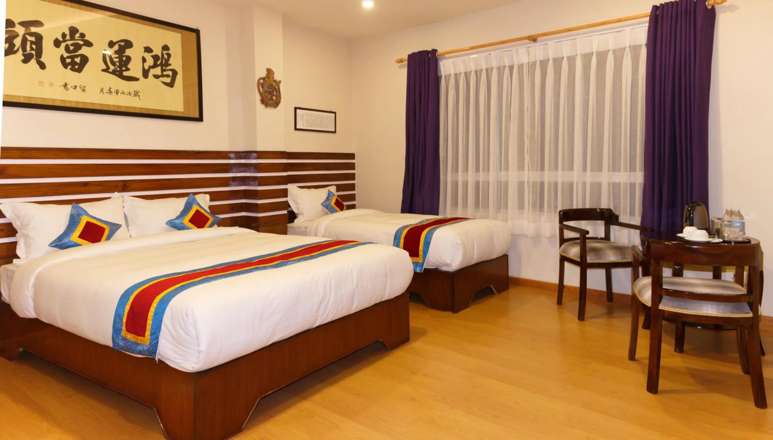 Bed in Truly Asia Boutique Hotel