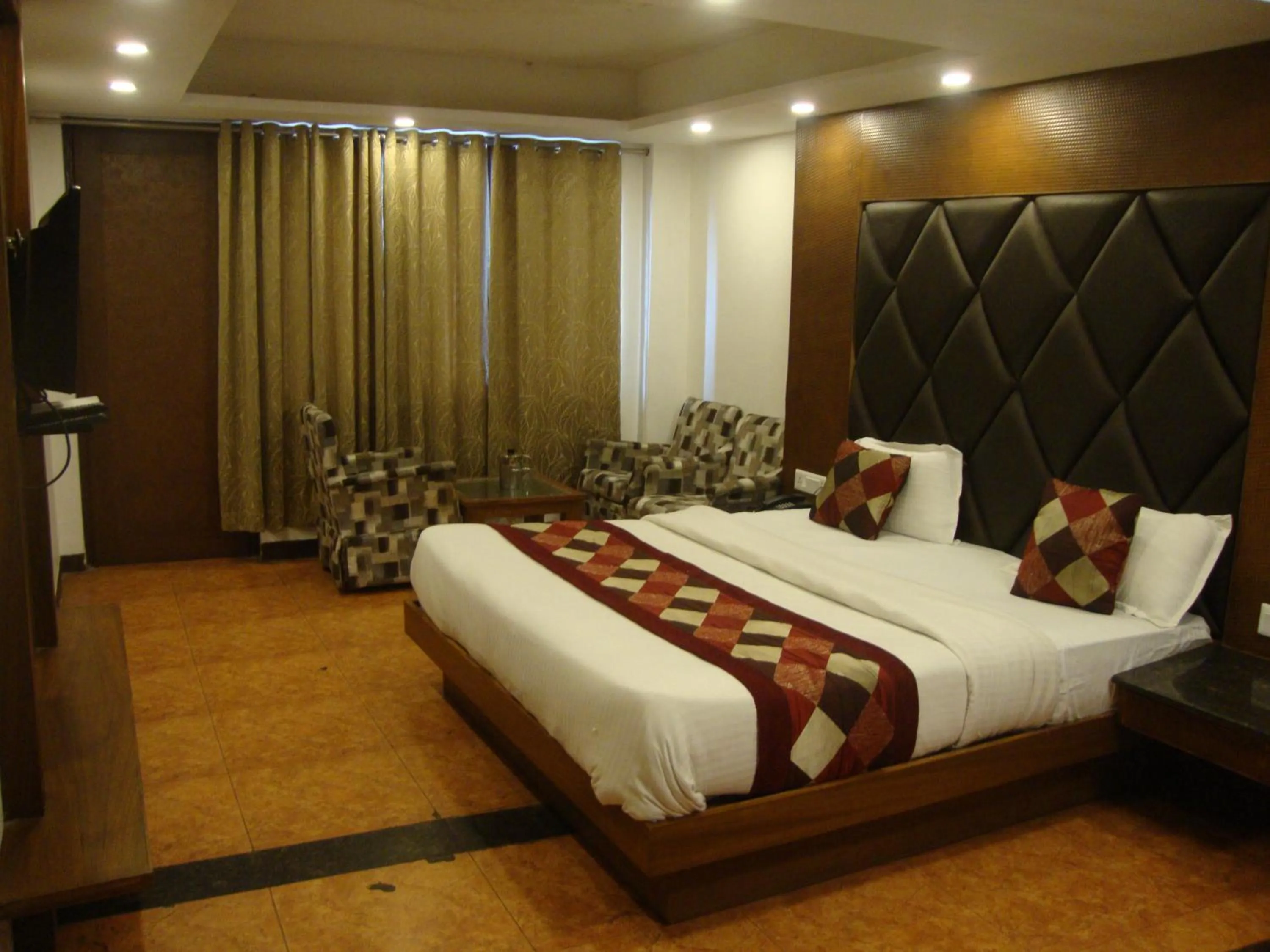 Bed in Hotel Hamers International