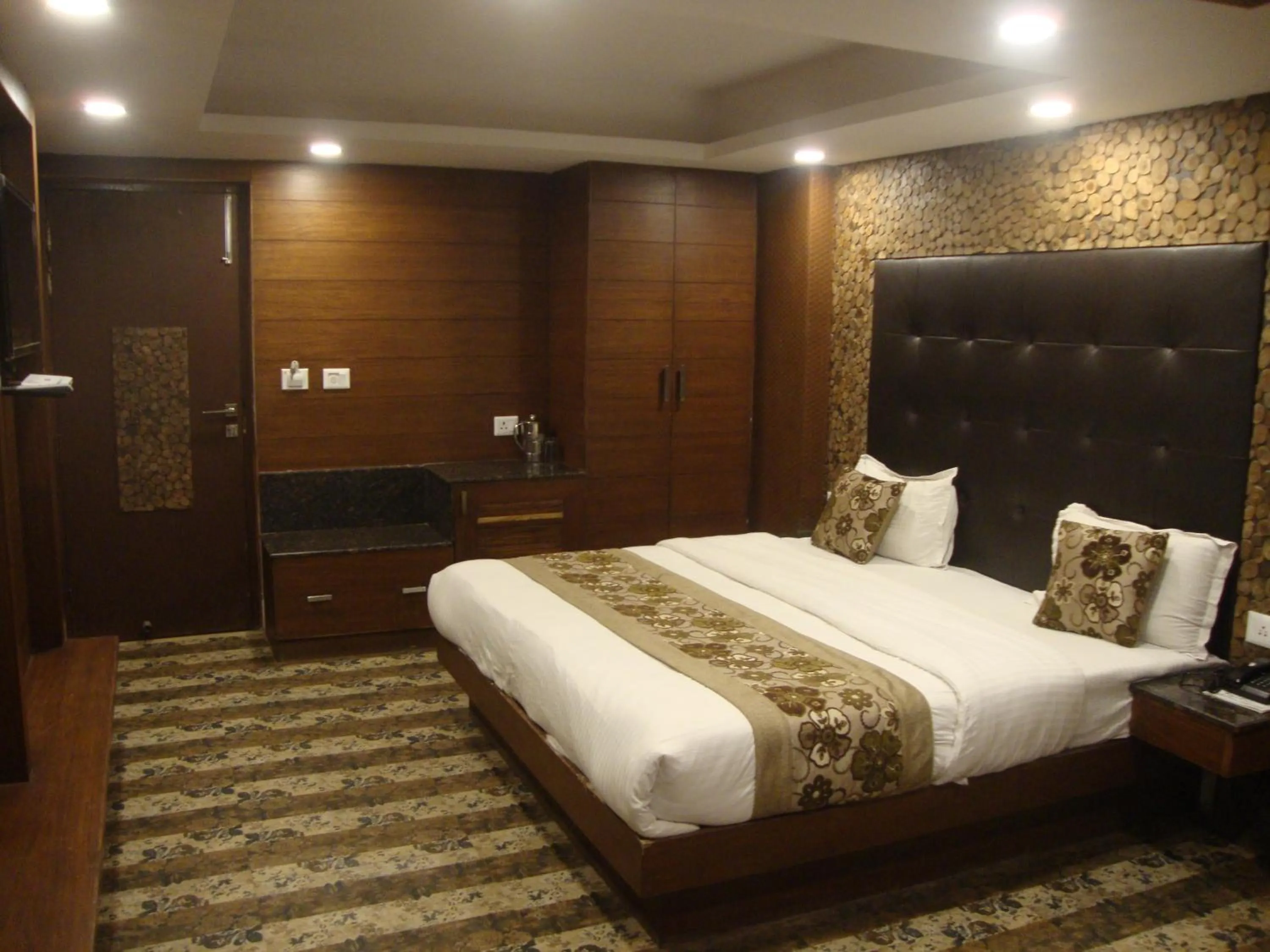 Bed in Hotel Hamers International