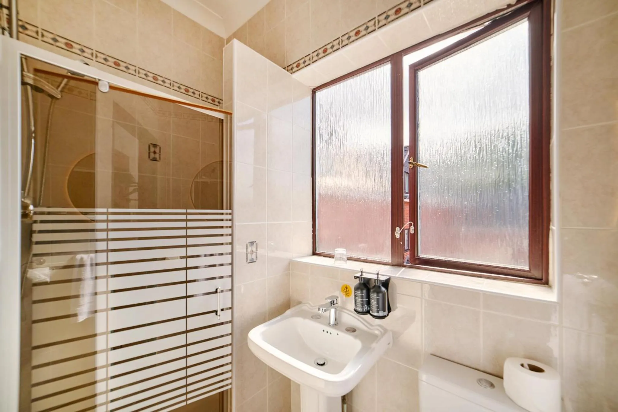 Bathroom in Garner Hotel Birmingham South East by IHG