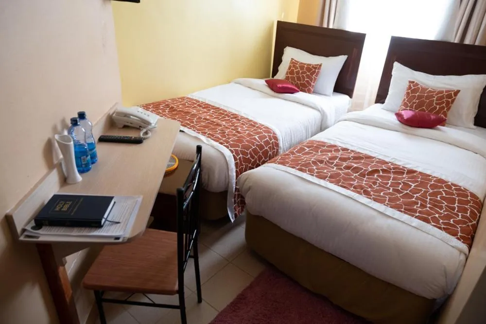 Bed in Javilla Eagles Safari Guest house