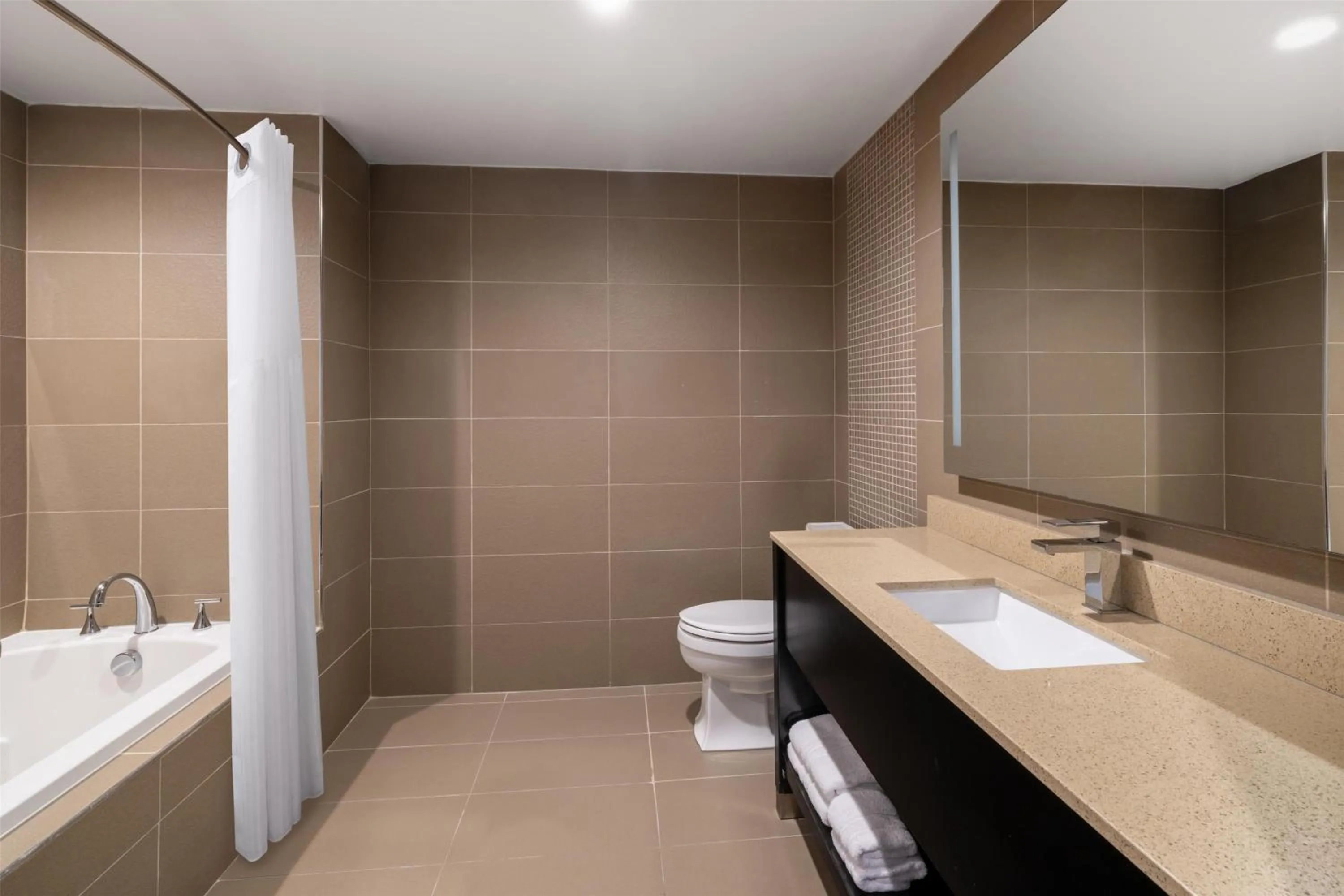 Bathroom in Best Western Premier NYC Gateway Hotel