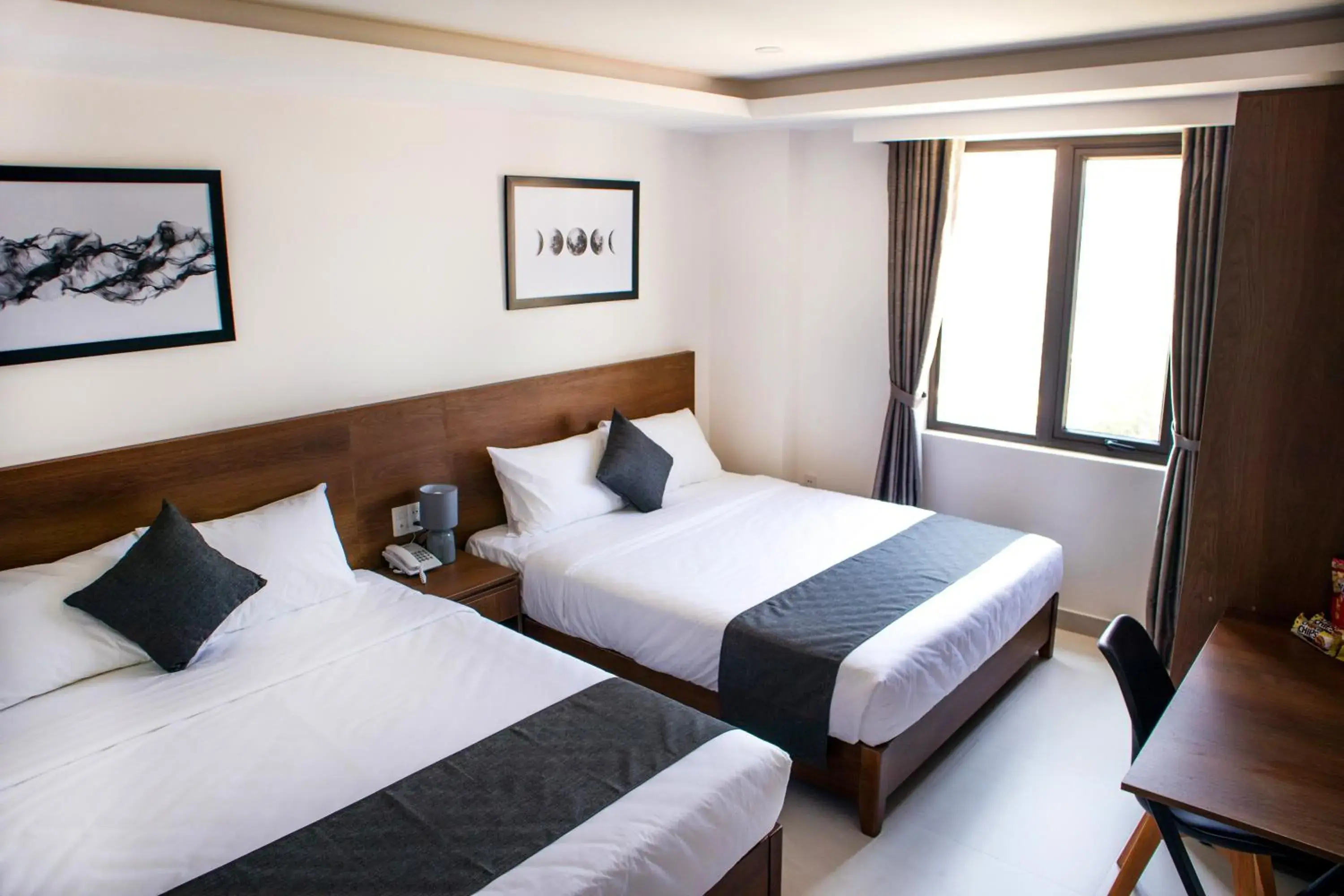 Superior Queen Room with Two Queen Beds in Robin Hotel Danang Superior Queen Room with Two Queen Beds in Robin Hotel Danang