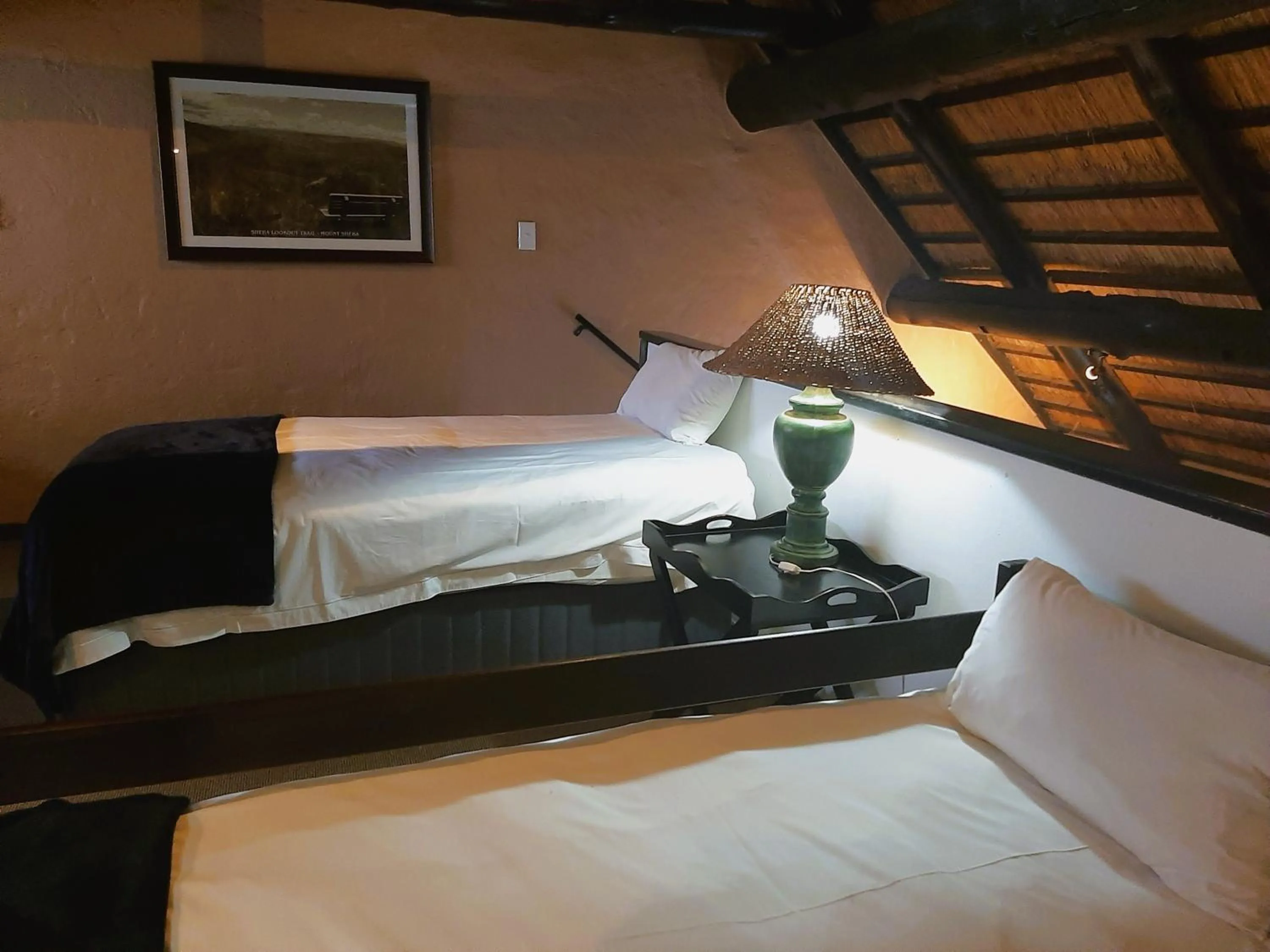 Bed in Mount Sheba Rainforest Hotel - Mountain Spring Water