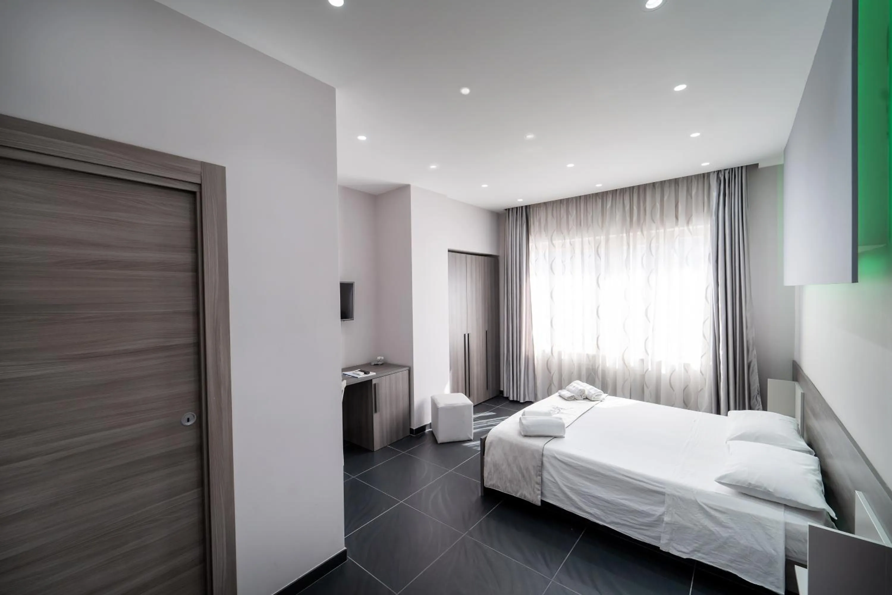 Photo of the whole room, Bed in Al Campanile H Napoli Centro, by ClaPa Group Dislocated Hospitality