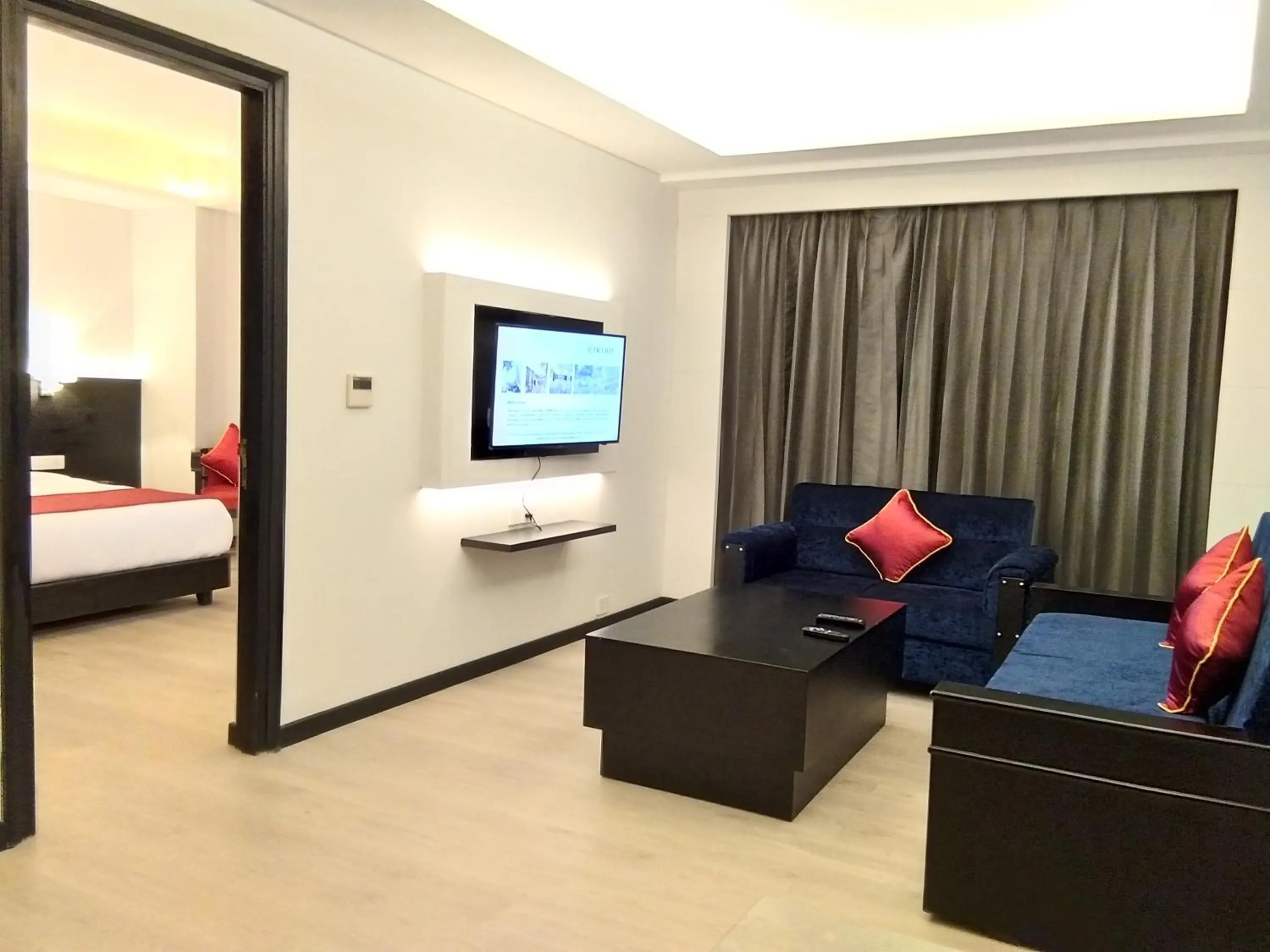 Living room, Bed in Ramada Encore Jalandhar