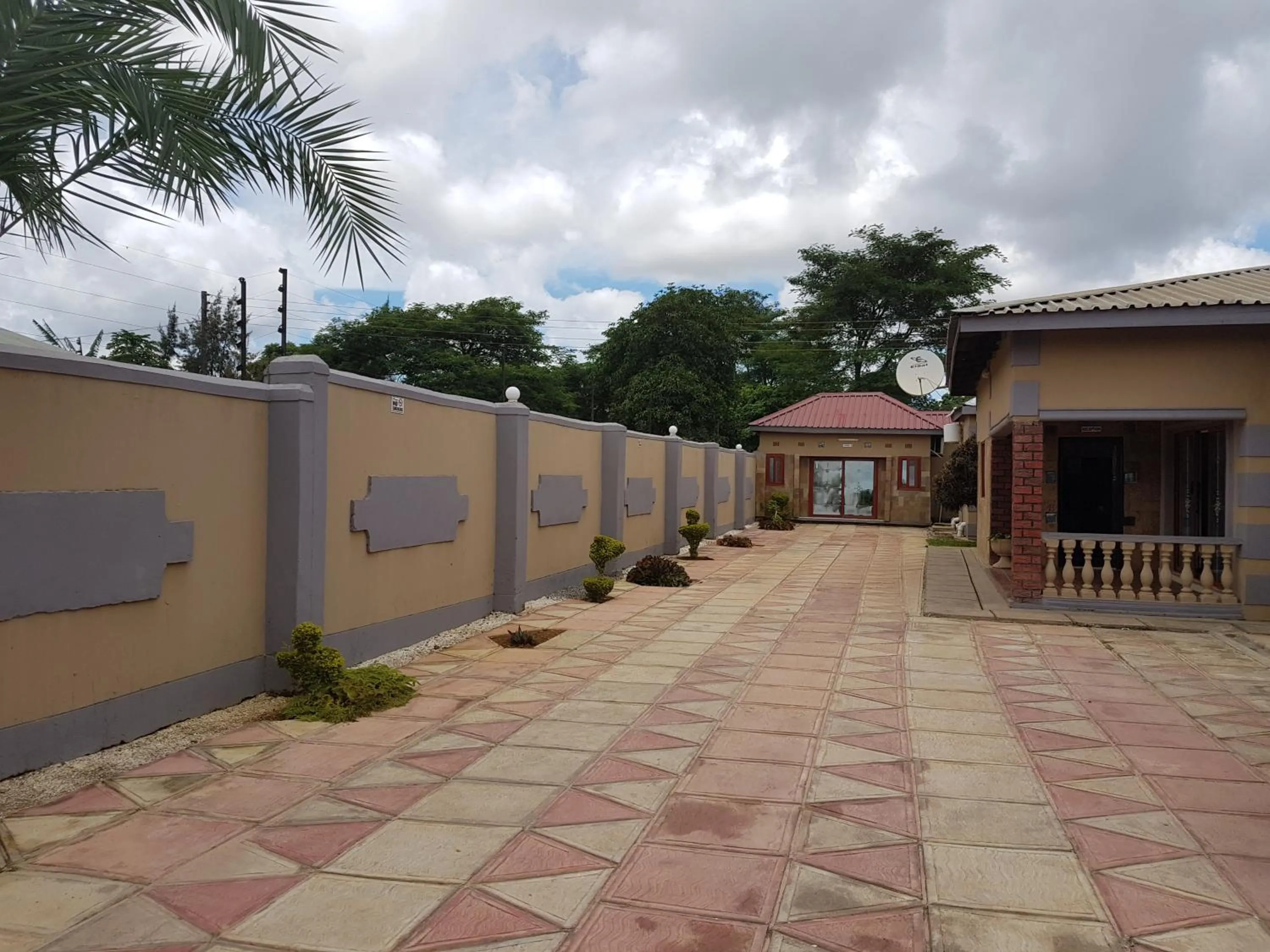 Property logo or sign in Rugems Executive Lodge