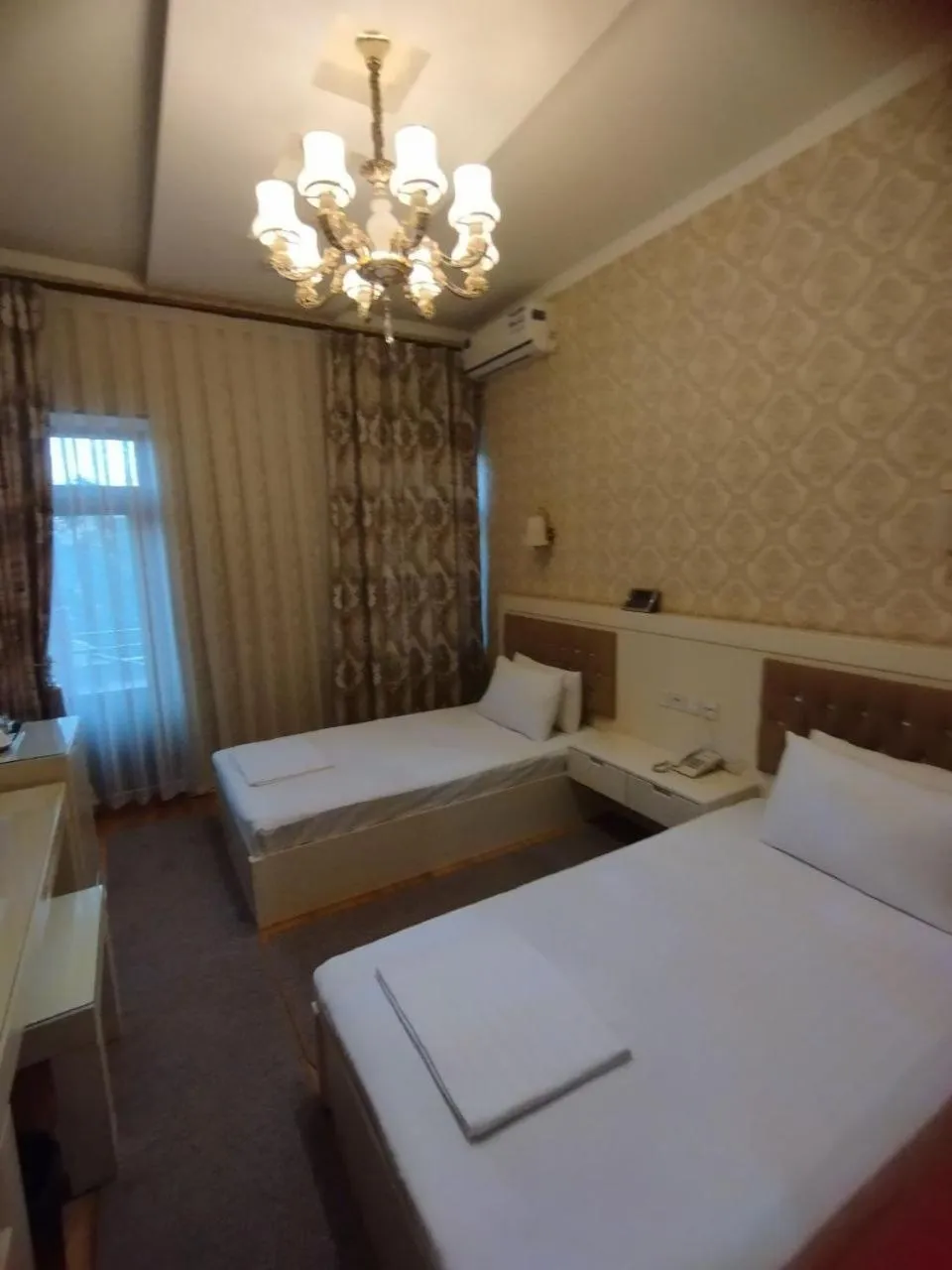 Bed in Hotel Afrosiyob