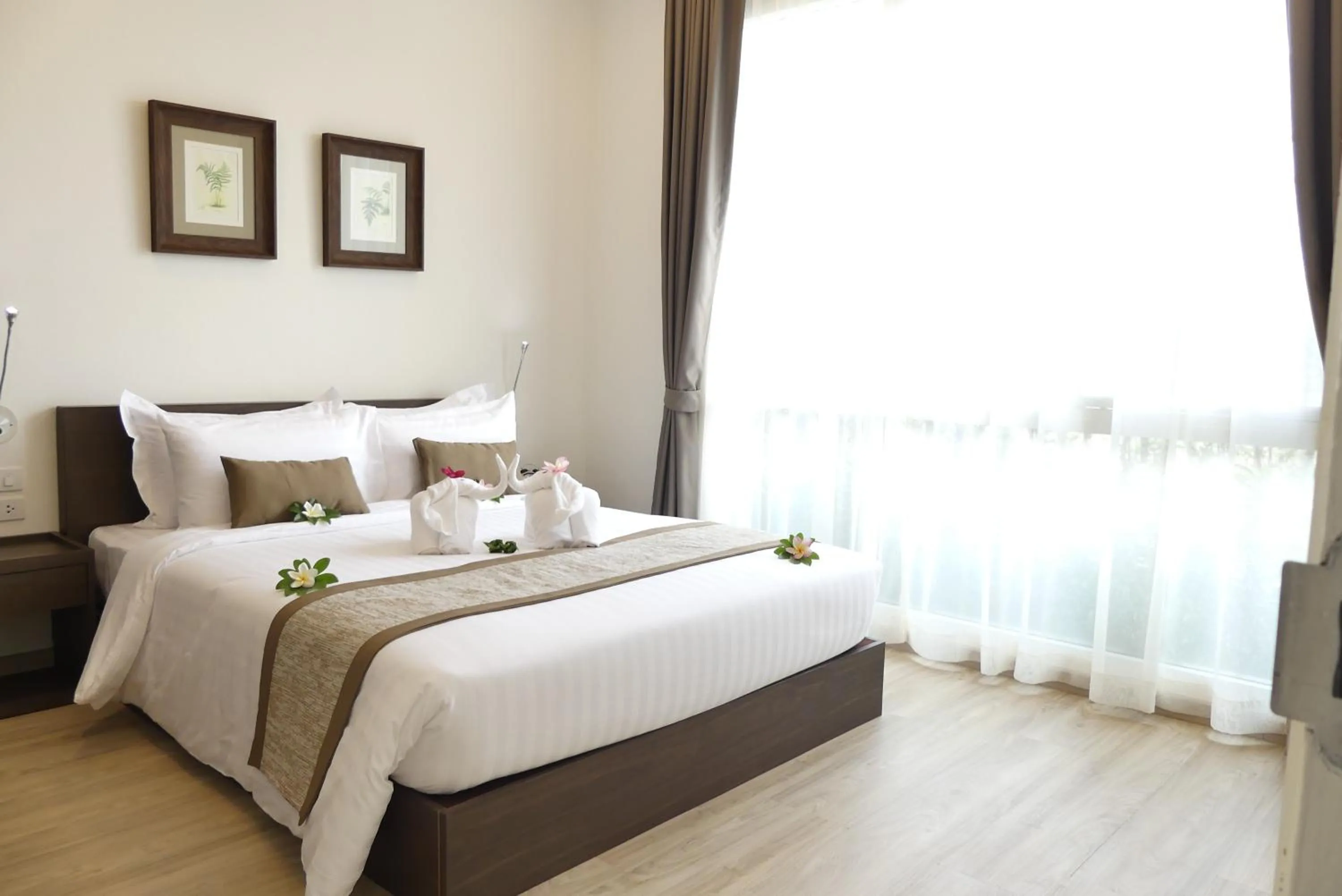 Photo of the whole room, Bed in The Garden 304