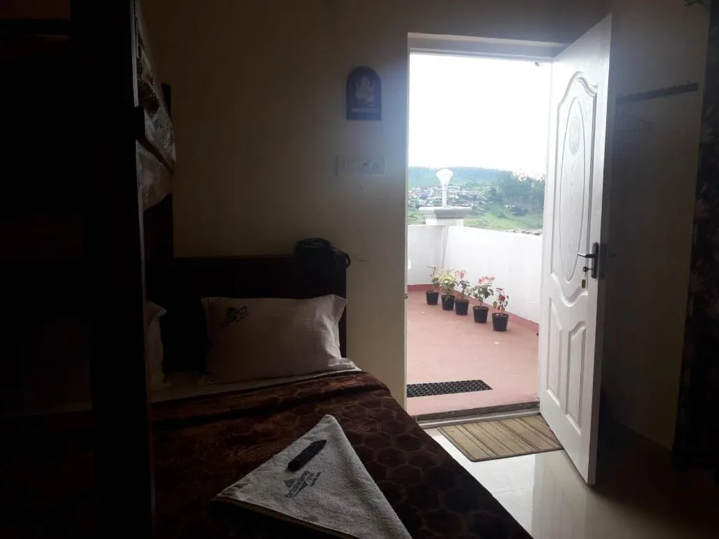 Bed in Drizzle Drop Inn