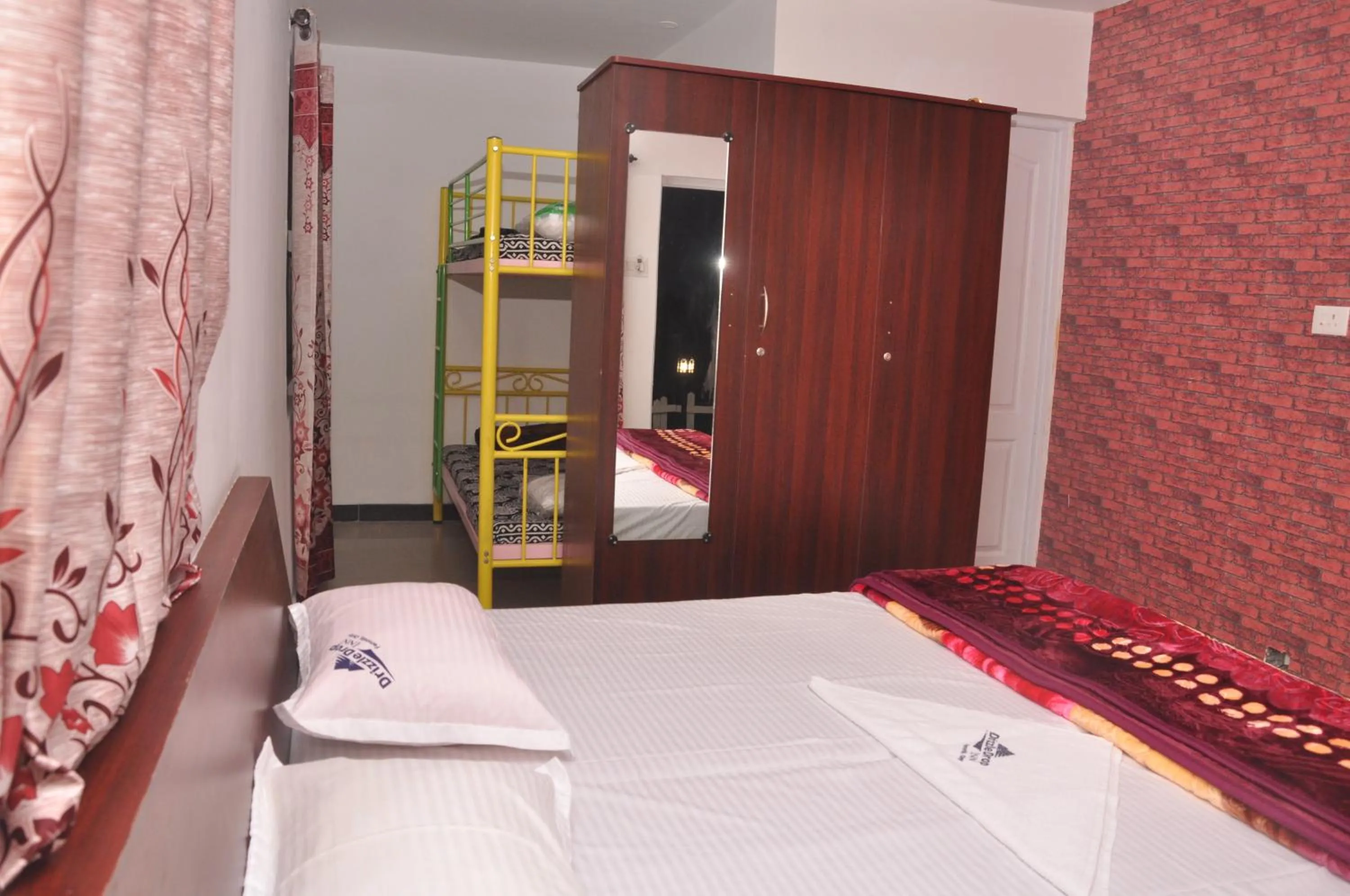 Bed in Drizzle Drop Inn