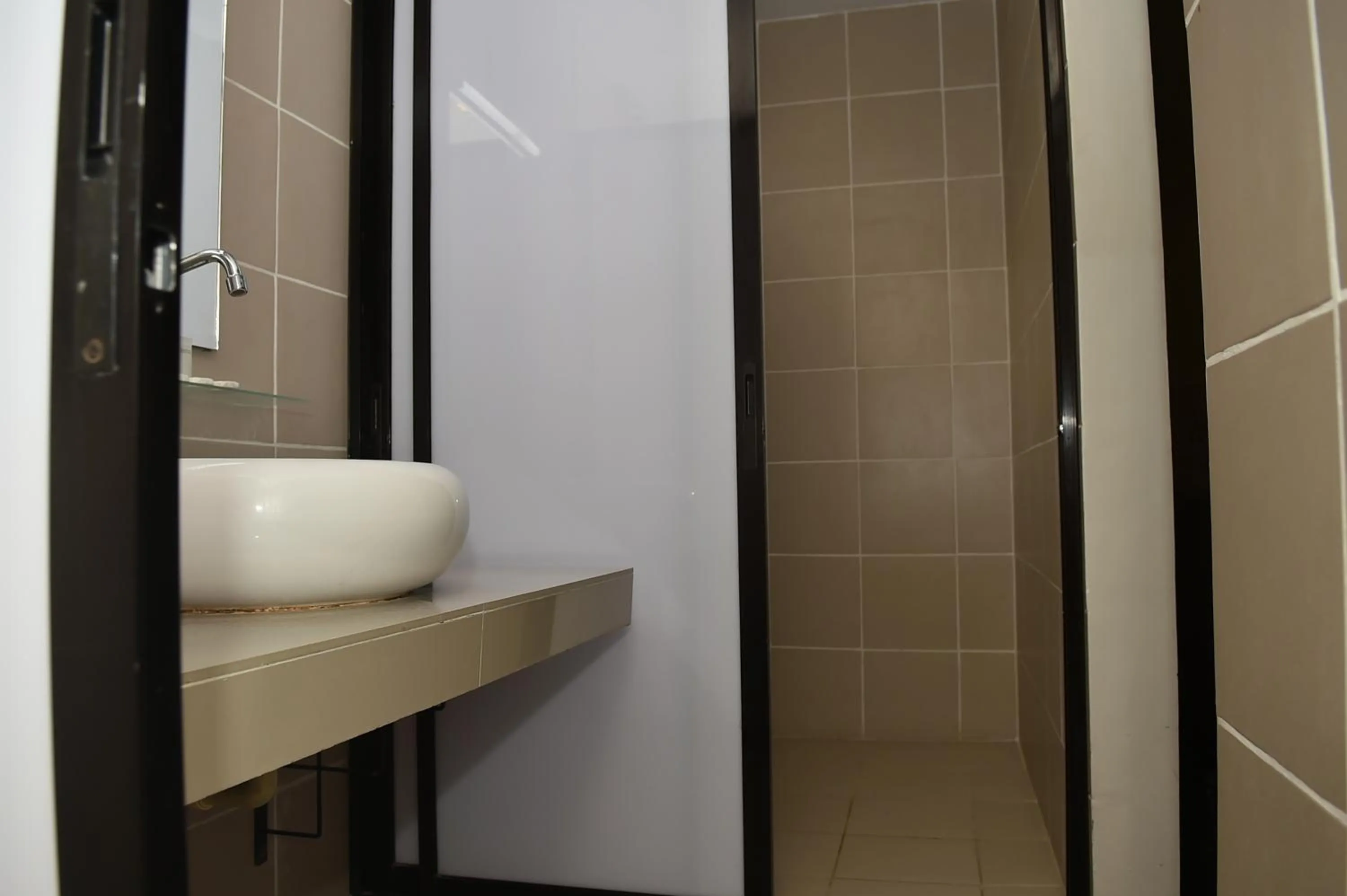 Toilet in Columbus Plaza Hotel