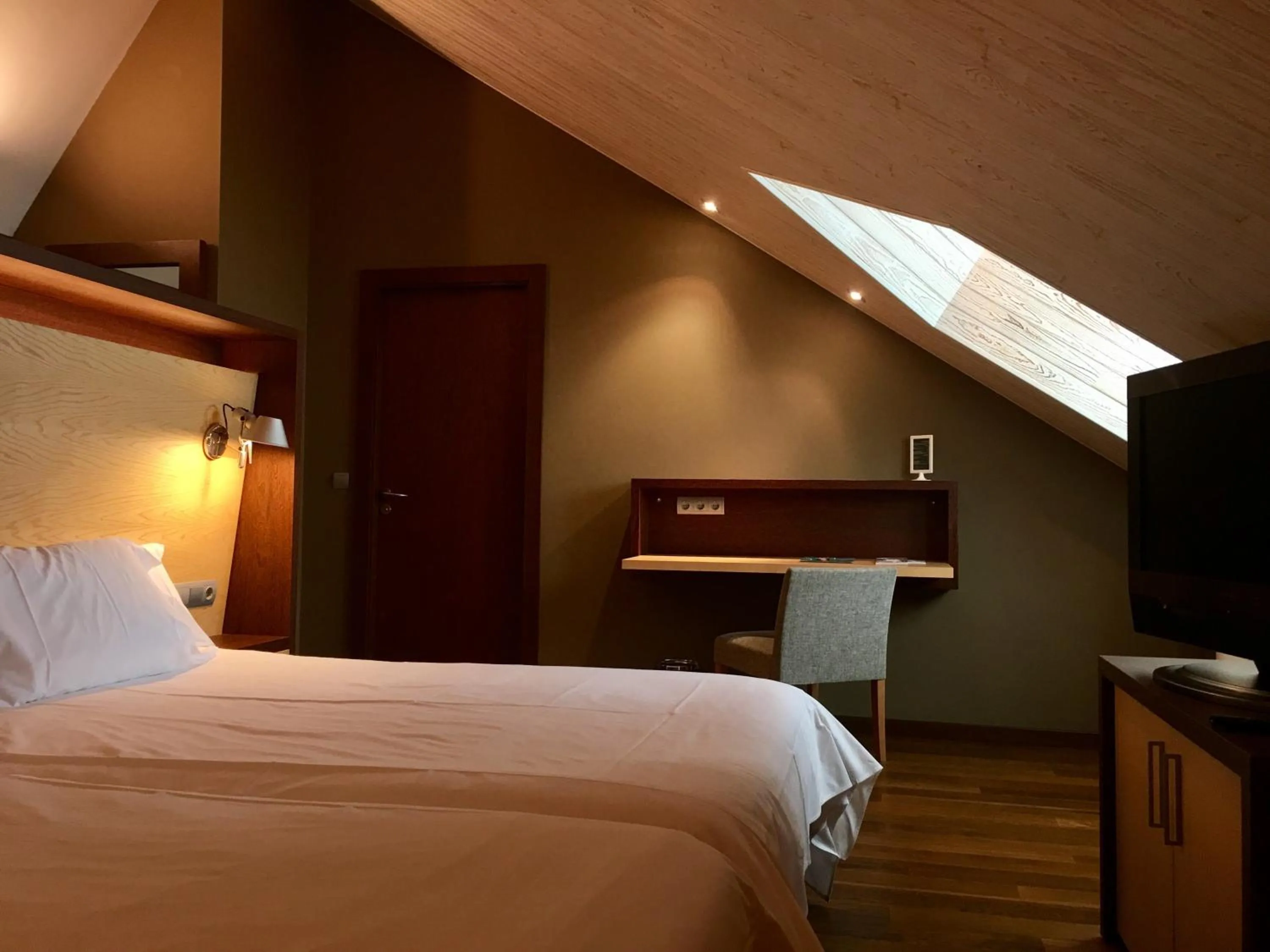 Bed in SOMMOS Hotel Aneto