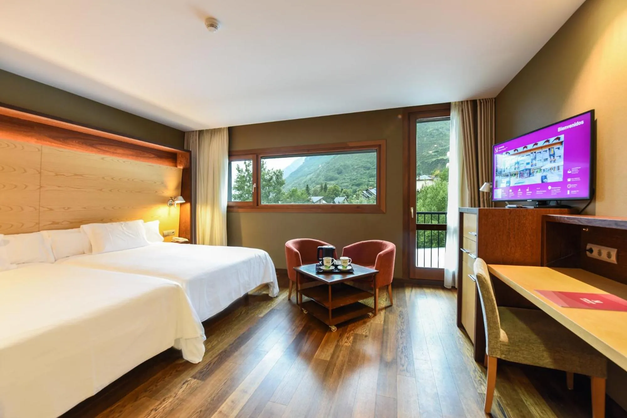 Bed in SOMMOS Hotel Aneto