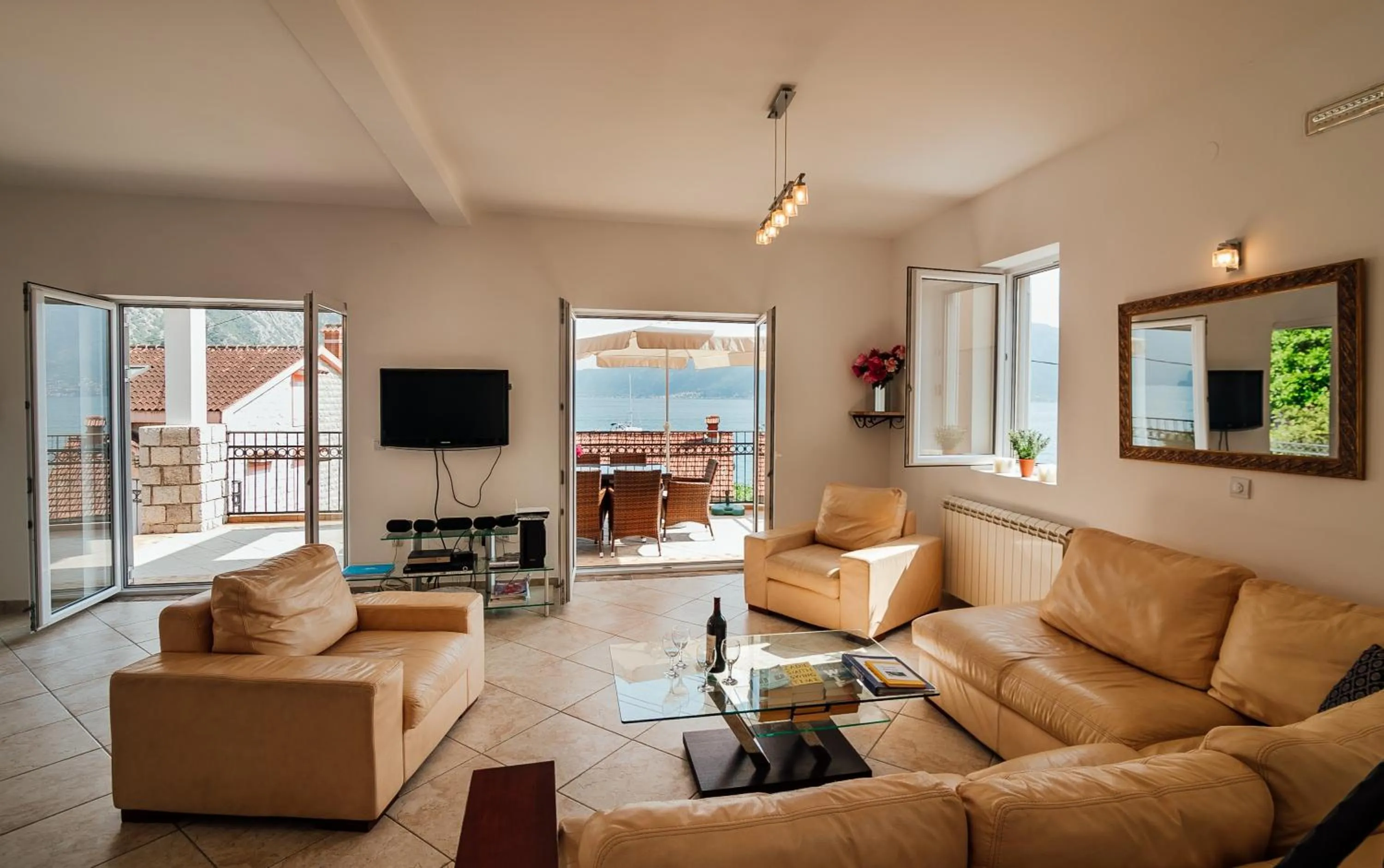 TV and multimedia in Spacious Family 4BR Seaside House, Fantastic Sea Views, 20 Meters to Beach